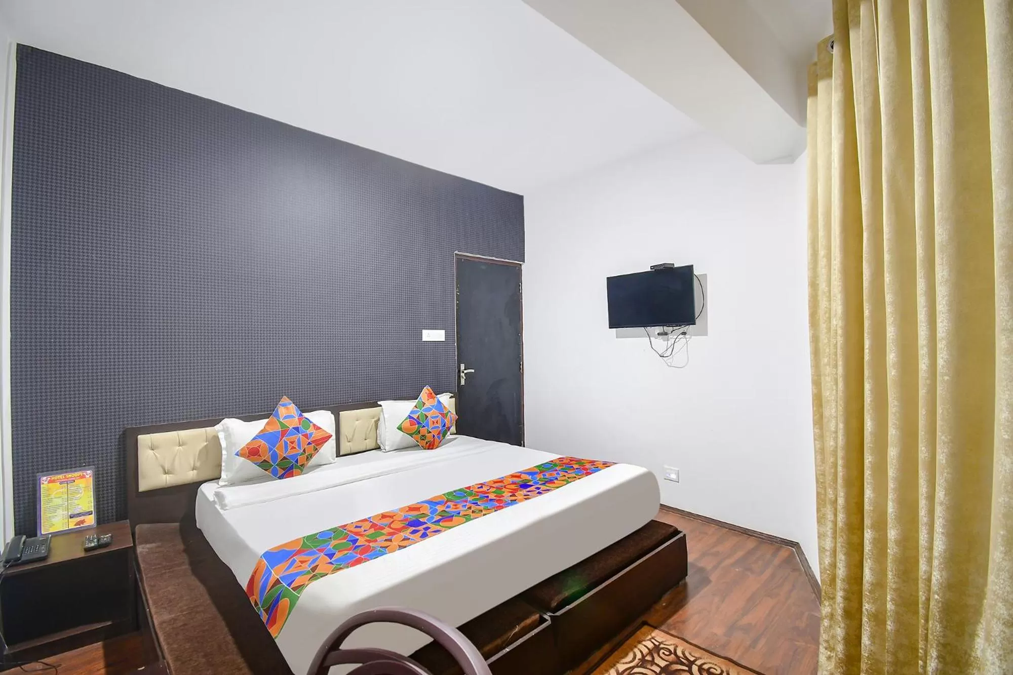 Communal lounge/ TV room, Bed in FabHotel Snoopy