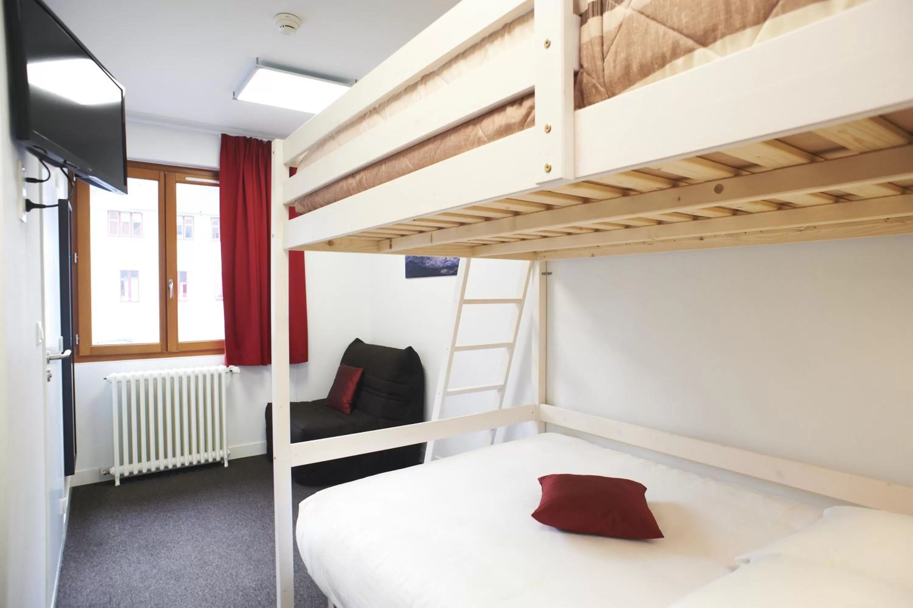 Bed in Logis Hotel Chateaubriand