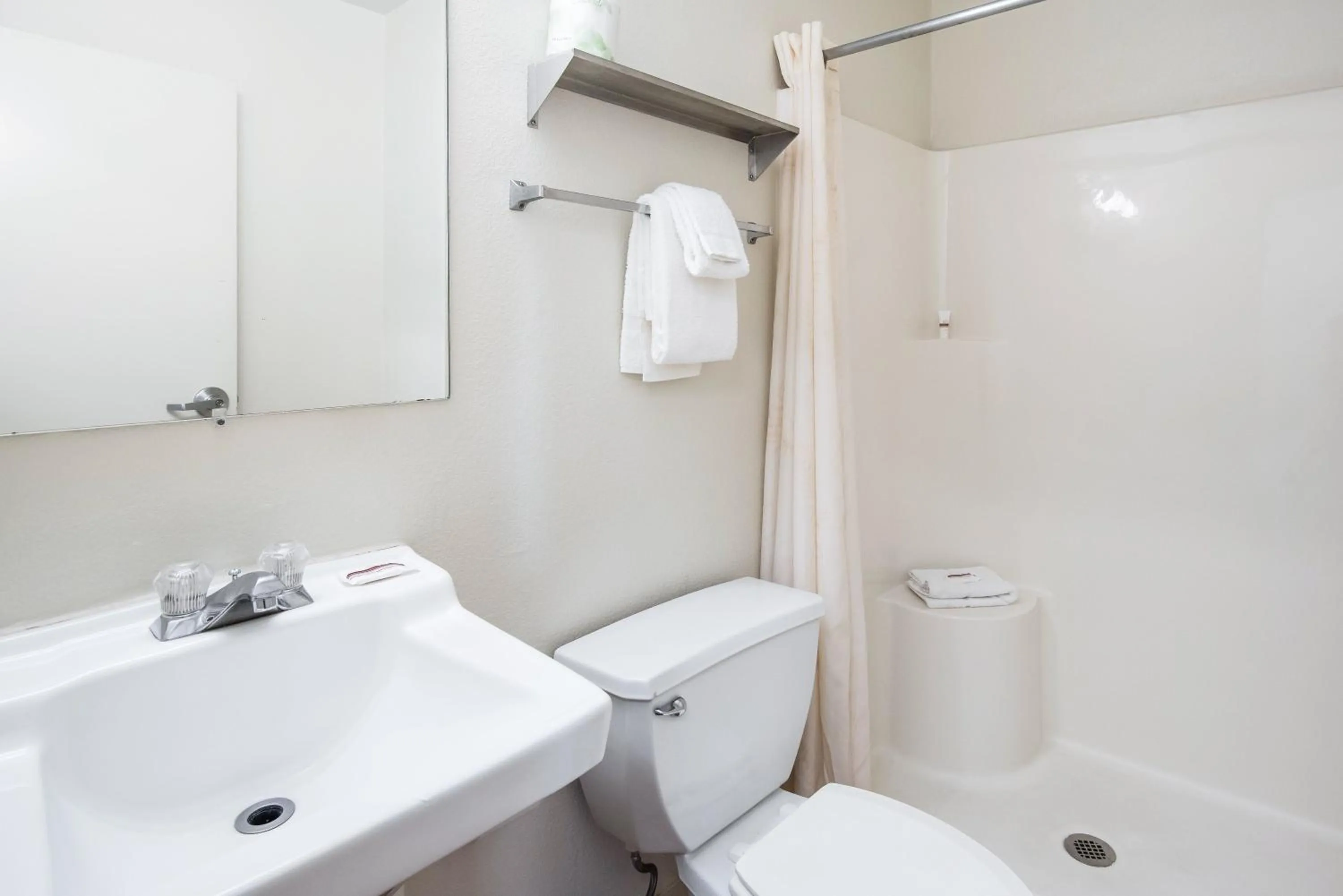 Photo of the whole room in HomeTowne Studios by Red Roof Colorado Springs - Airport