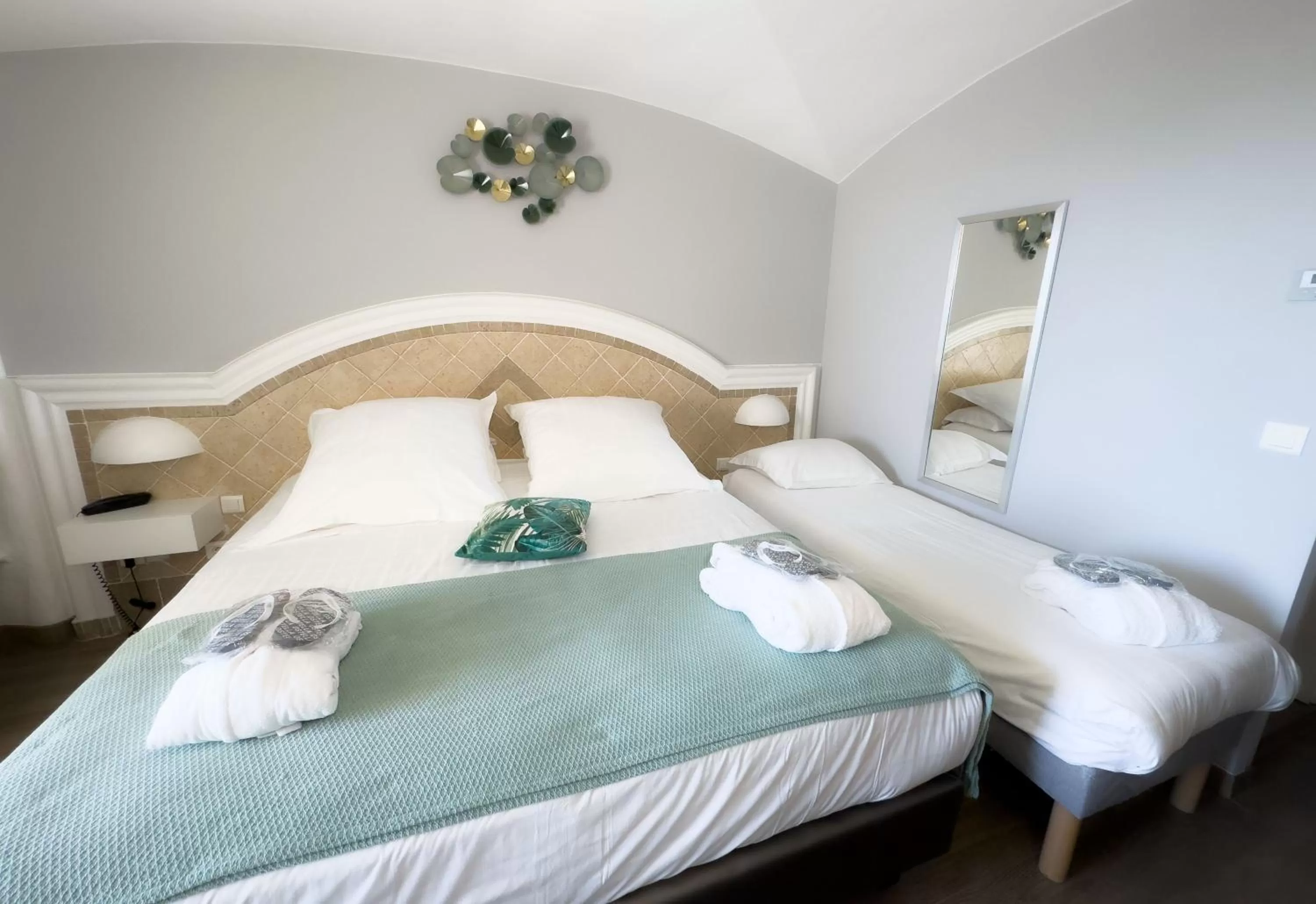 Bed in Ostella Spa & Resort