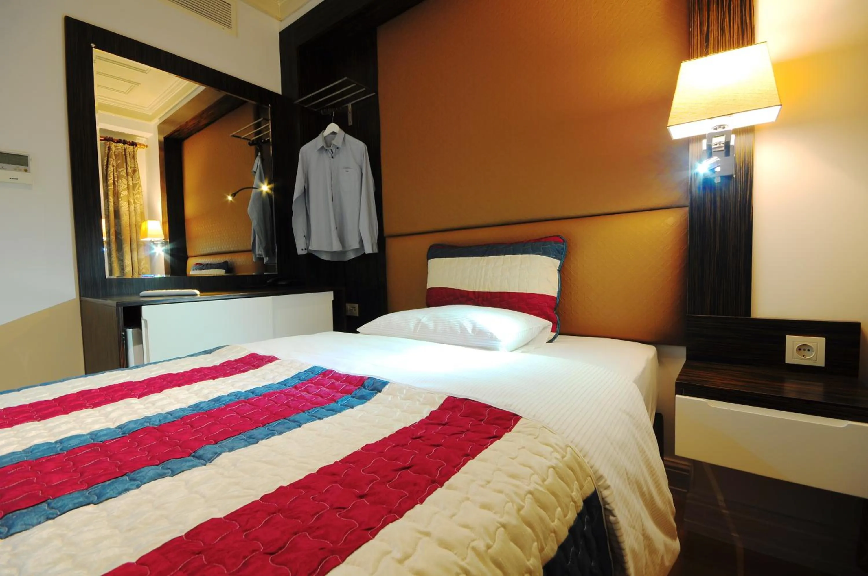 Bed in Ottopera Hotel