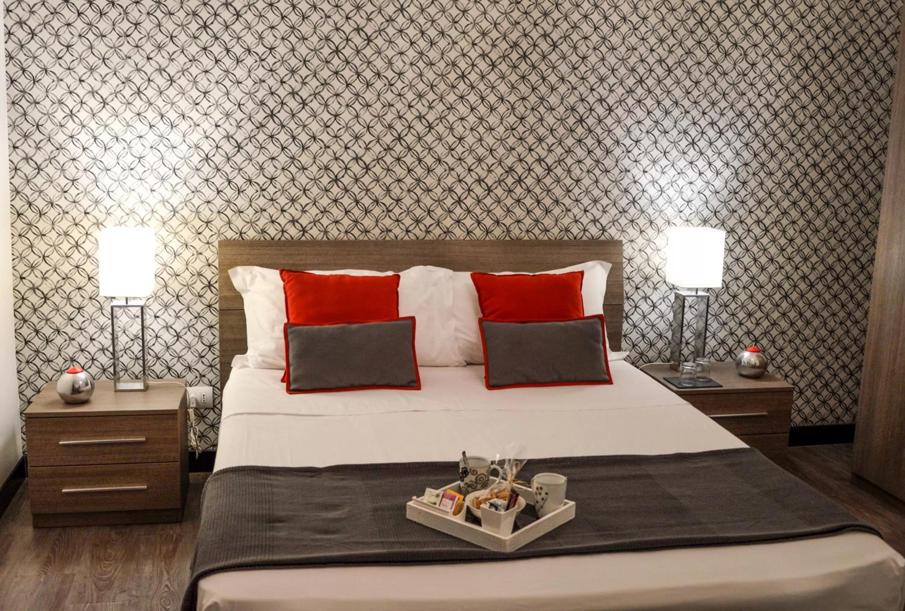 Bed in Nobilcasa Suites