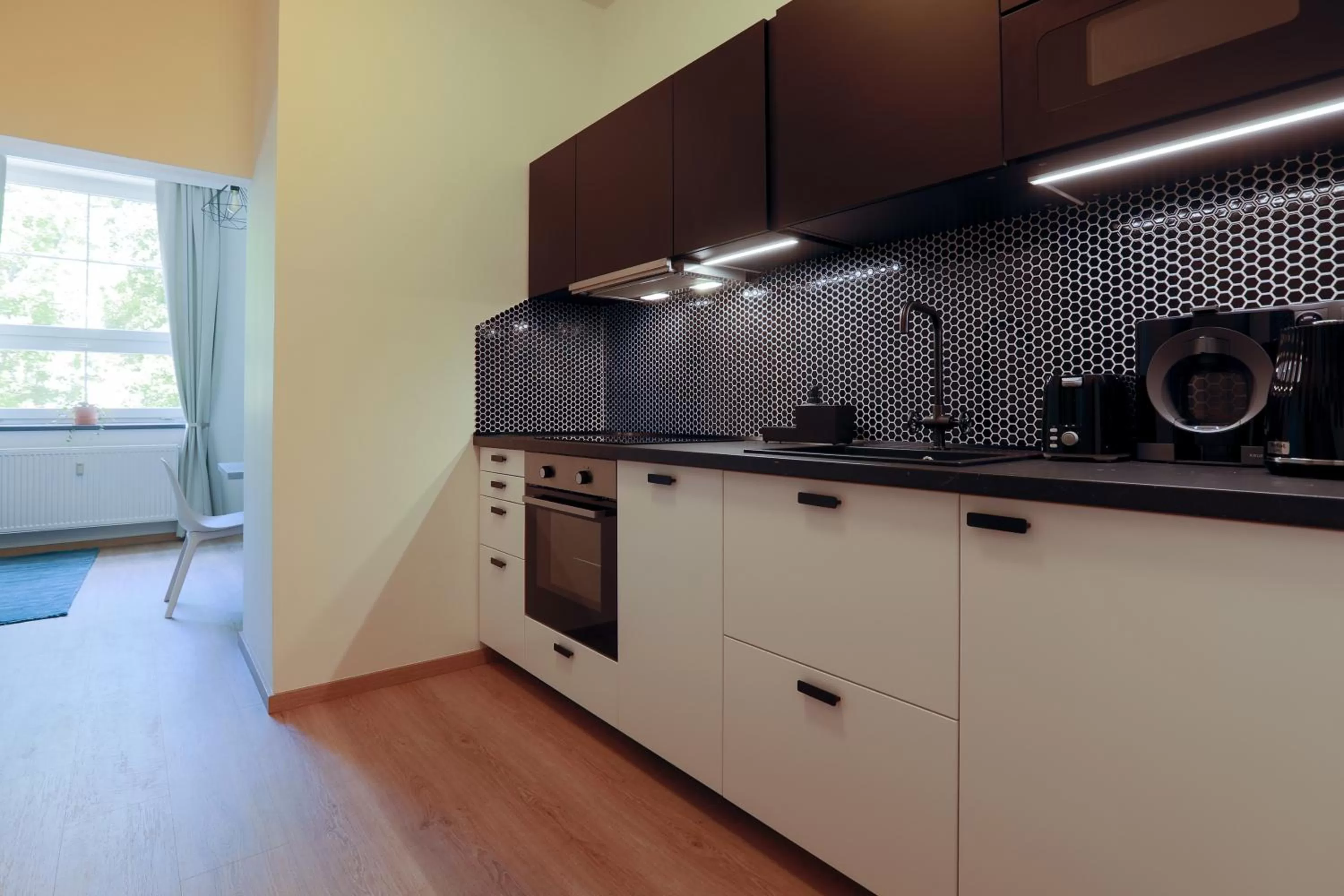 Kitchen or kitchenette in Avantgarde apartments