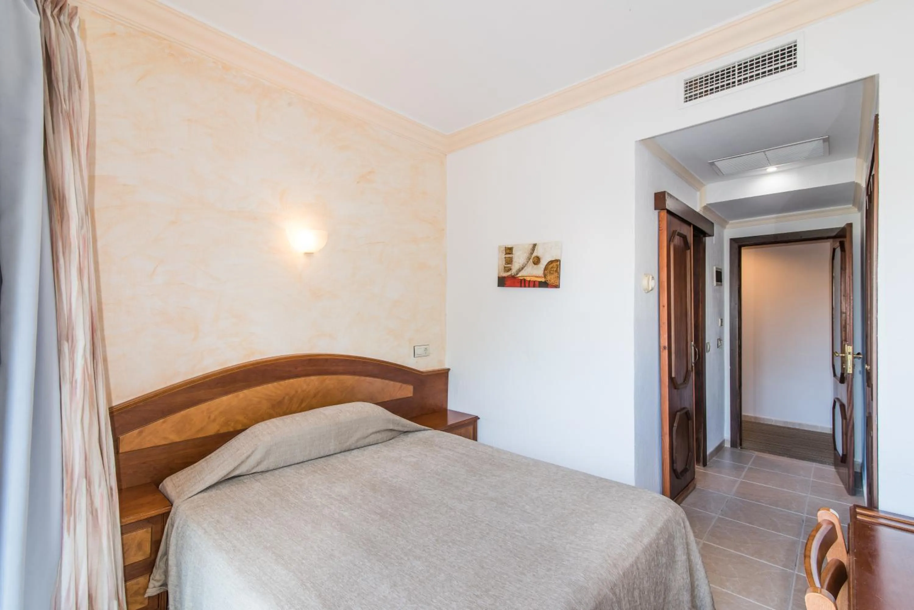 Bedroom in Hotel Baviera