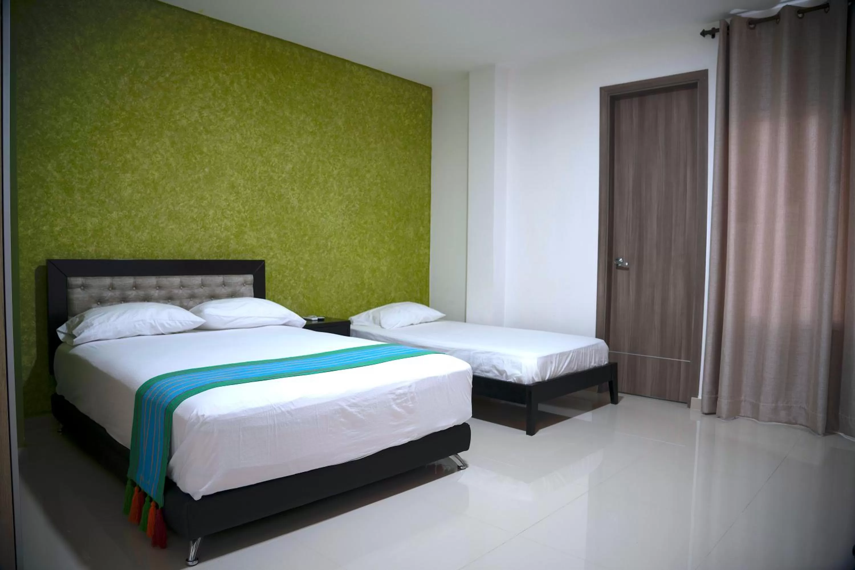 Bed in Hotel Emerawaa