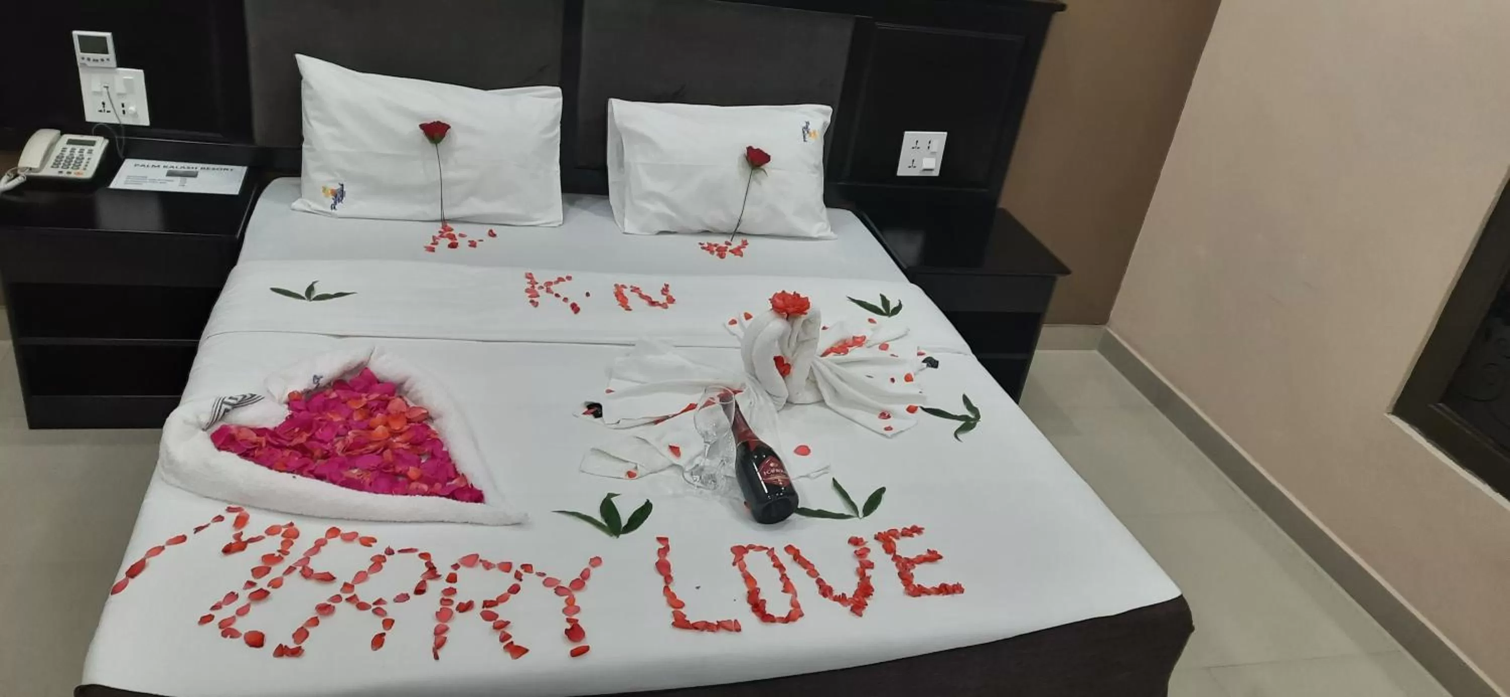 Bed in Palm Kalash Hotel