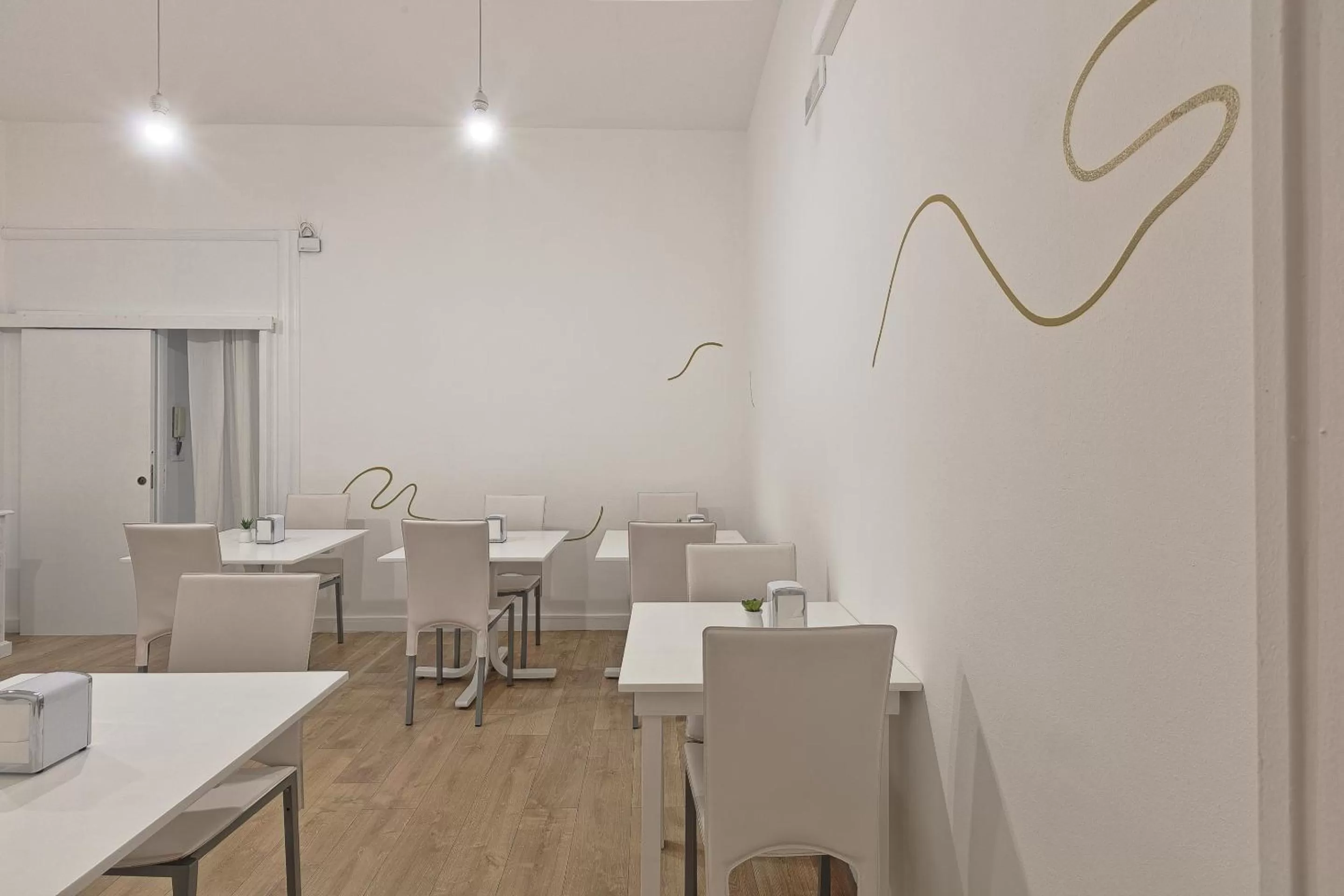 Communal lounge/ TV room in Afea Art & Rooms