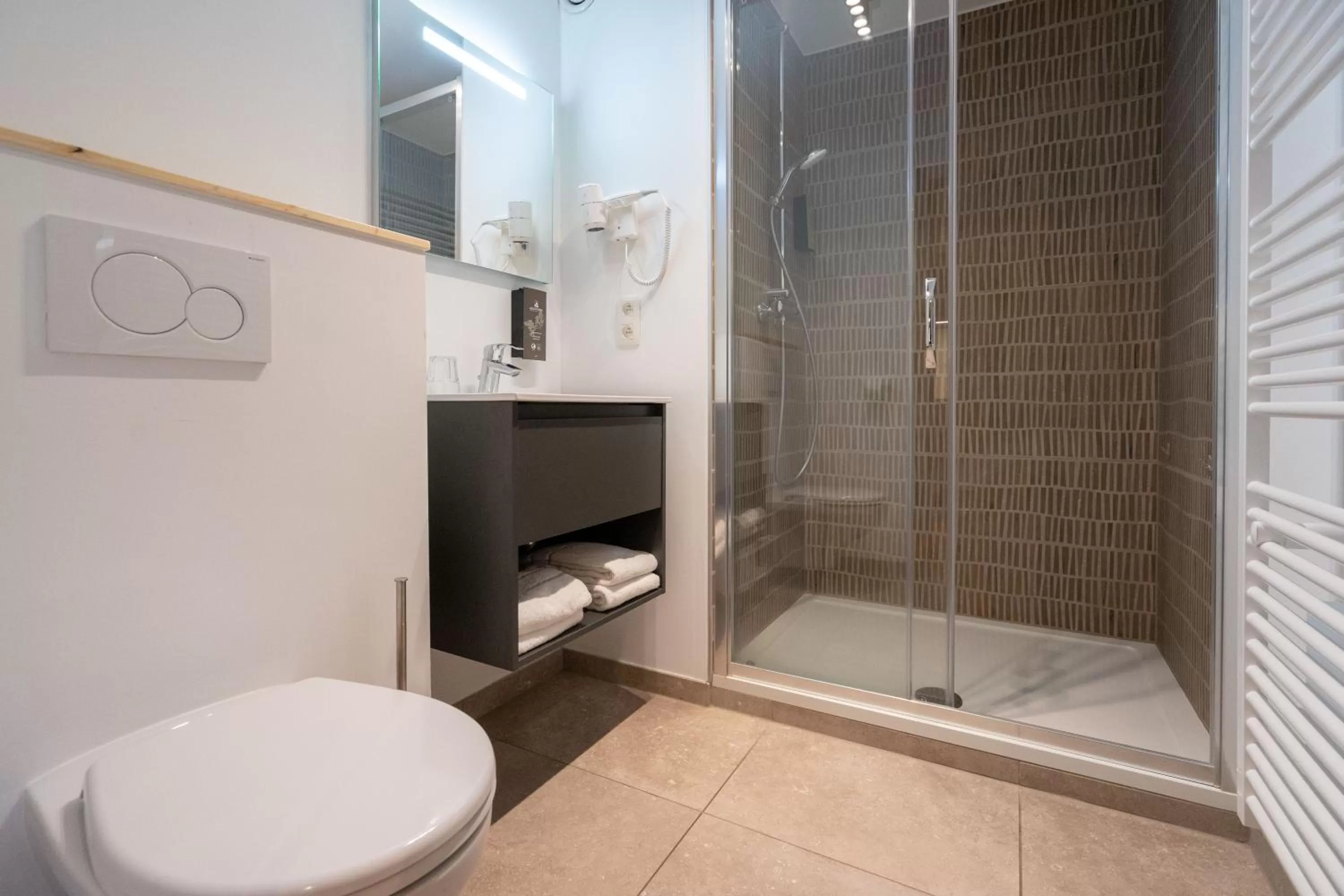 Bathroom in Appart hôtel En Ville