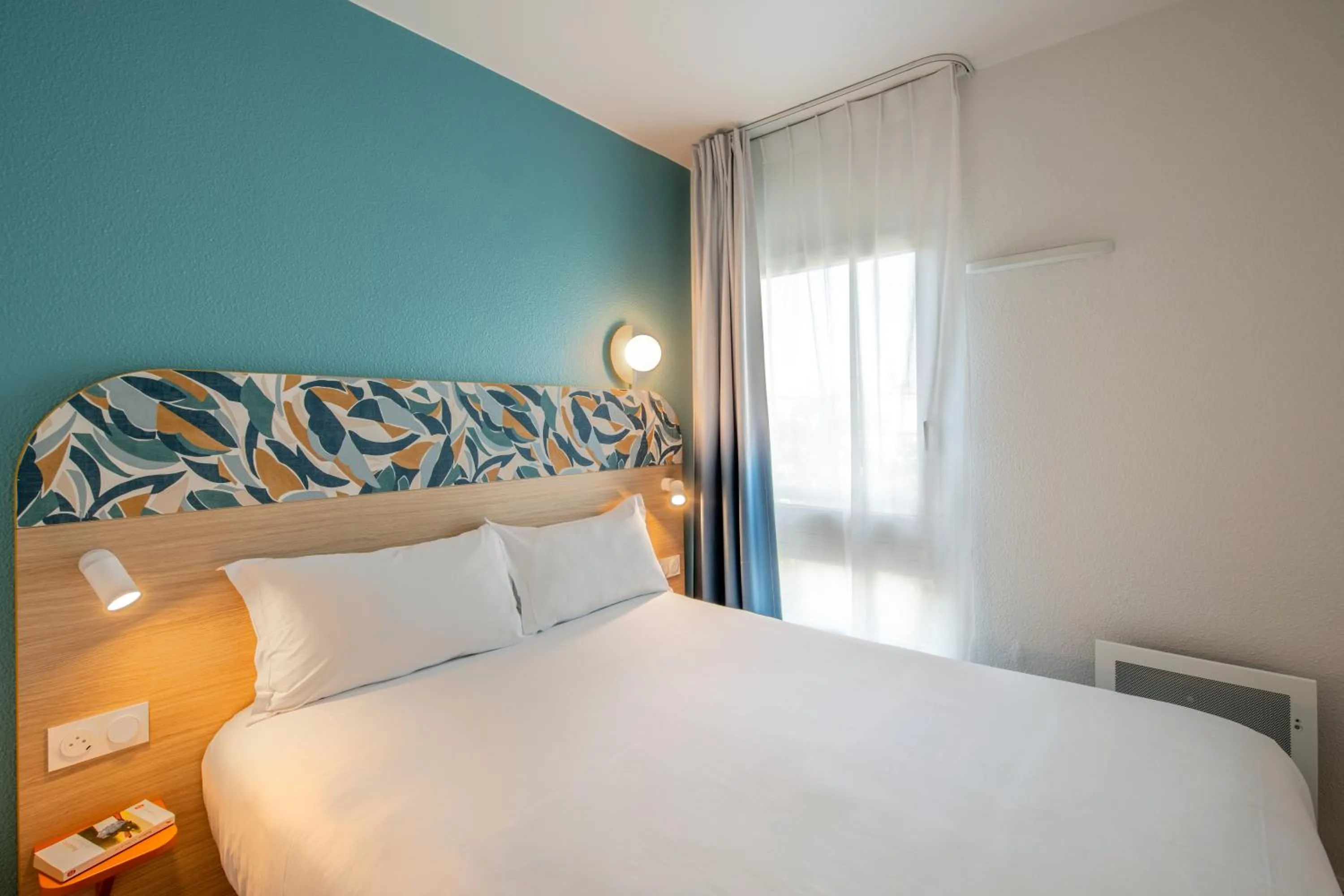 Bed in Aparthotel Adagio Access Paris La Villette