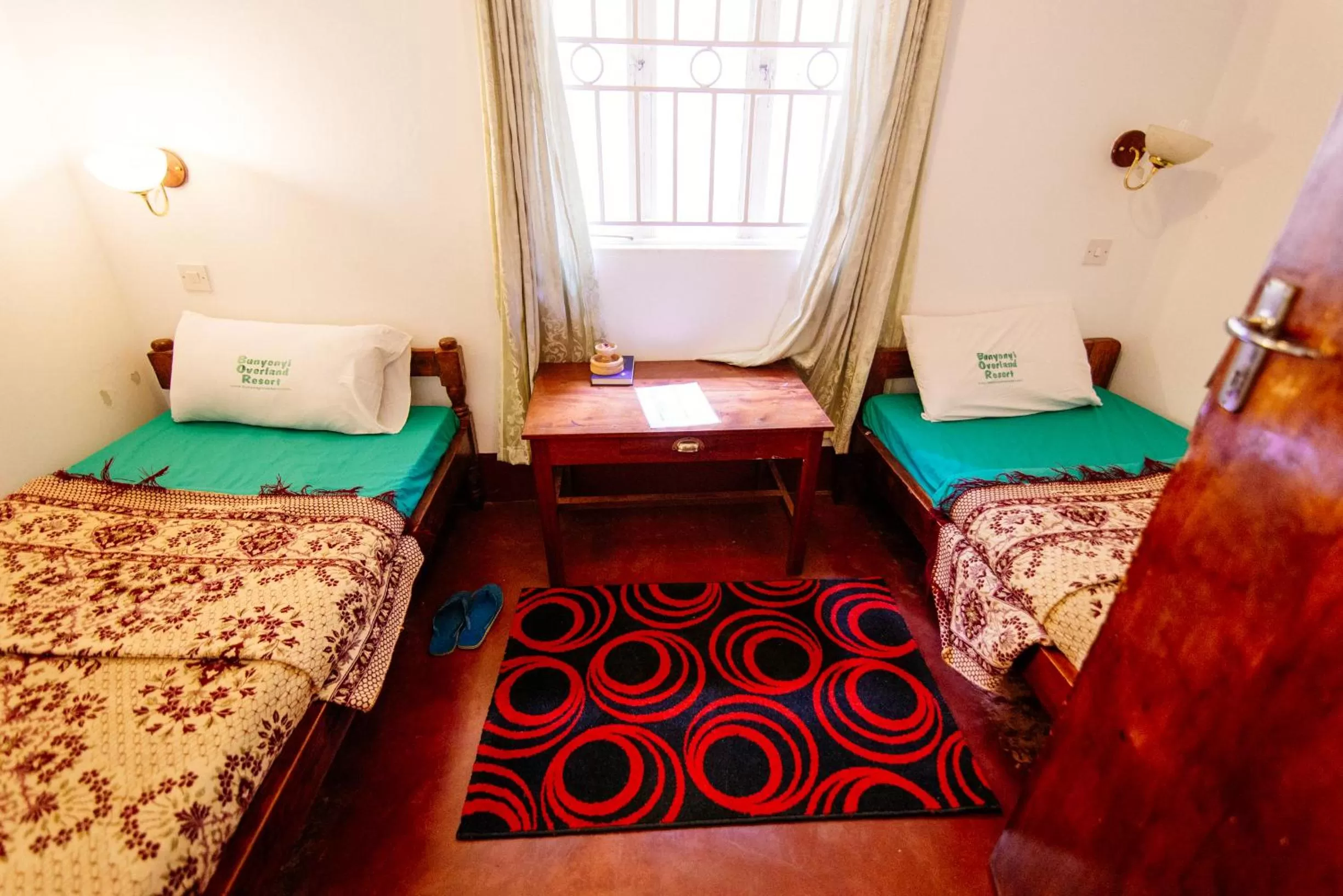 Bed in Bunyonyi Overland Resort
