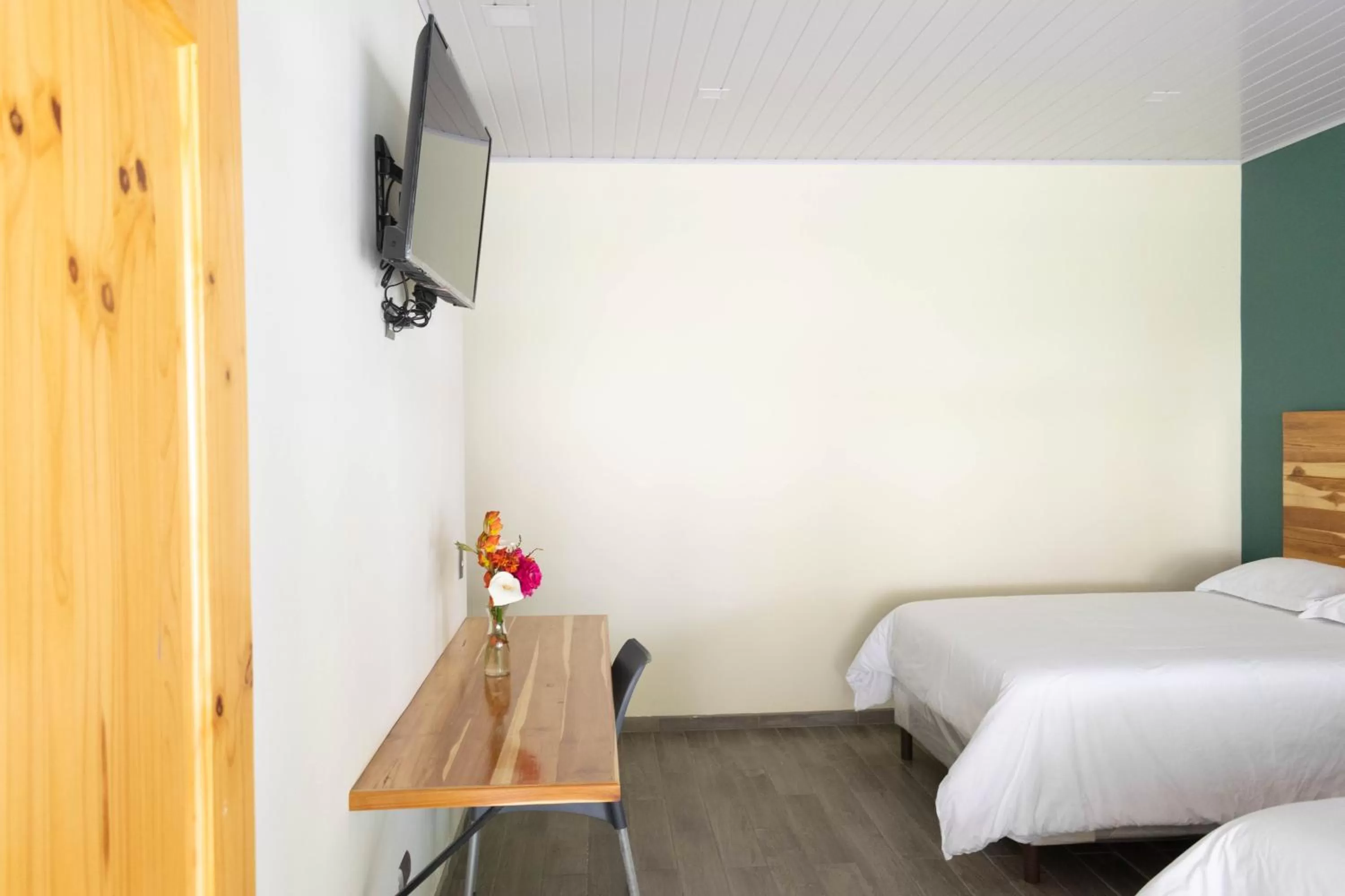 Bed in Casa Montana Hotel