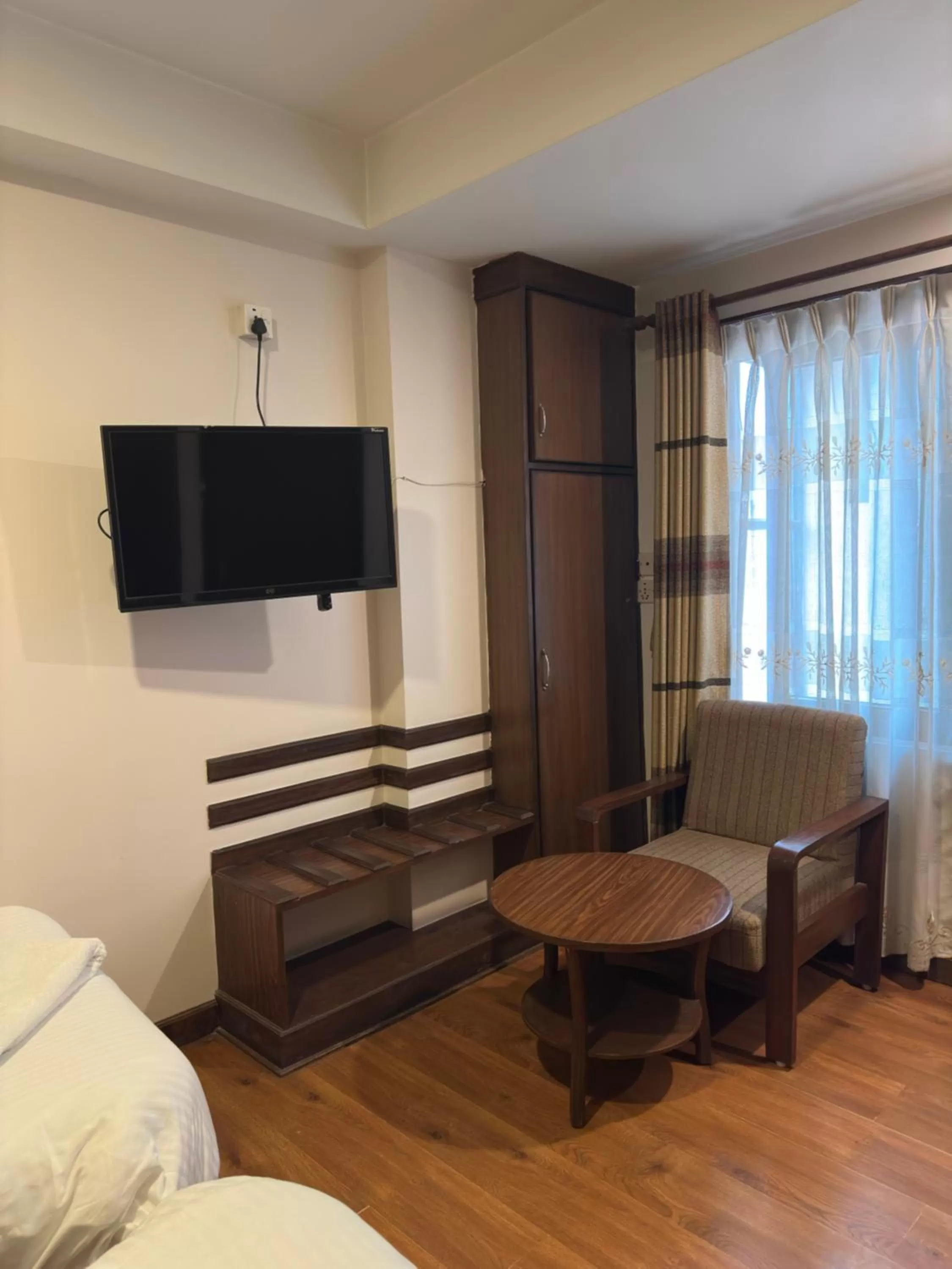 Communal lounge/ TV room, Bed in Hotel Everest Nepal