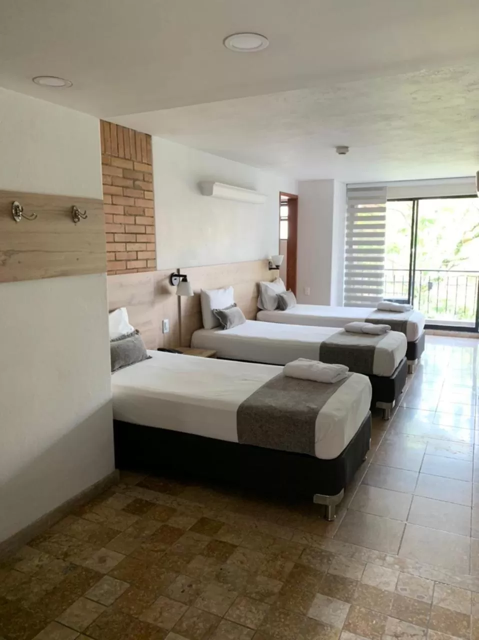 Photo of the whole room, Bed in Hotel Cabo de la Vela Medellin