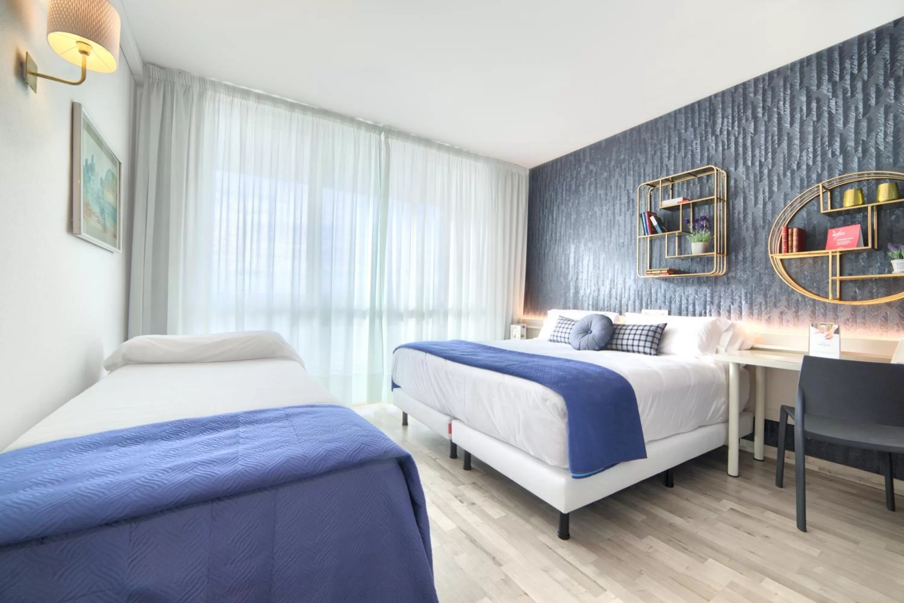 Bed in Hotel Luze El Villa