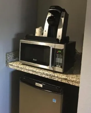 Deluxe King Room - Non-Smoking in Marble Waters Hotel & Suites, Trademark by Wyndham