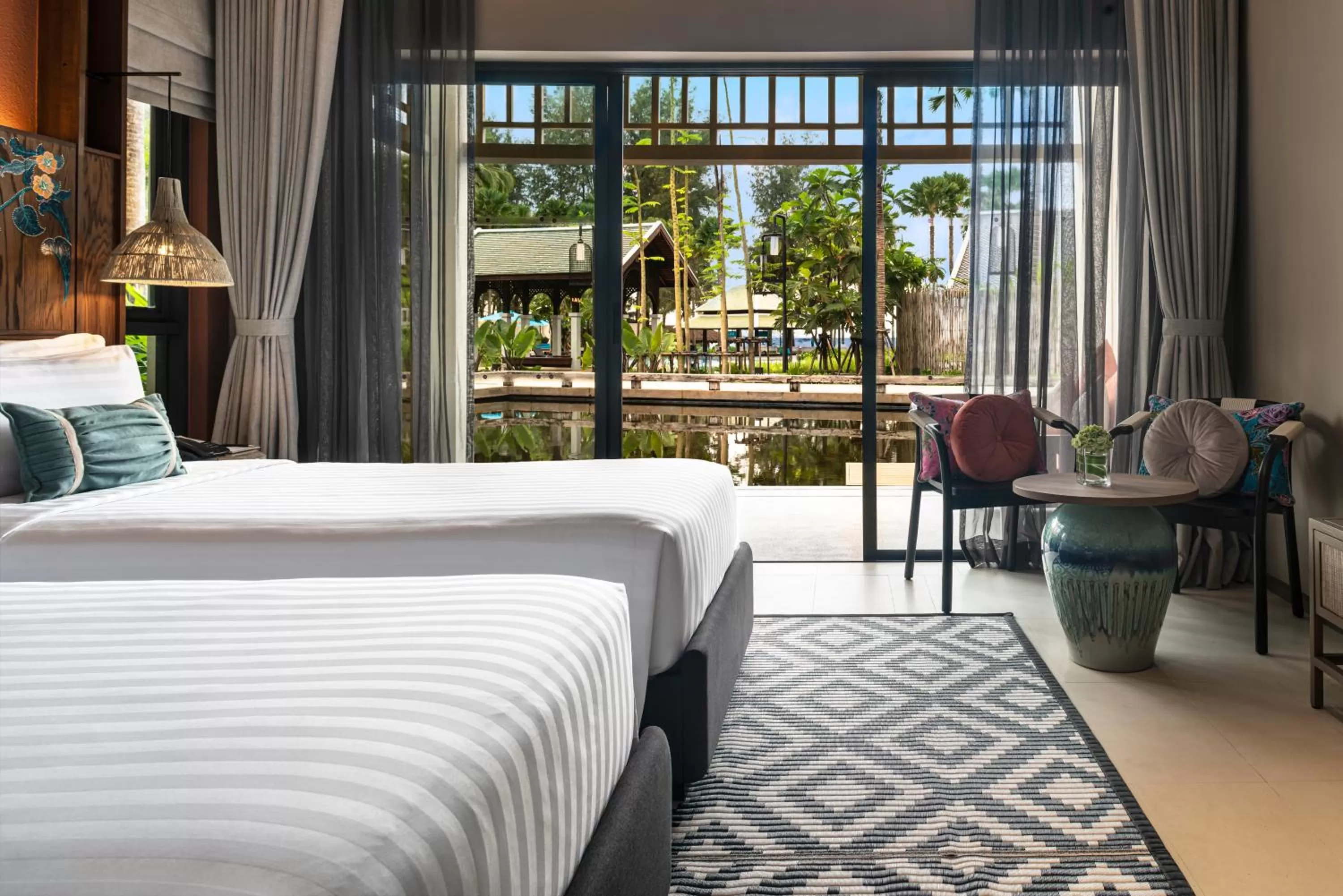 Photo of the whole room, Bed in Grand Mercure Khao Lak Bangsak