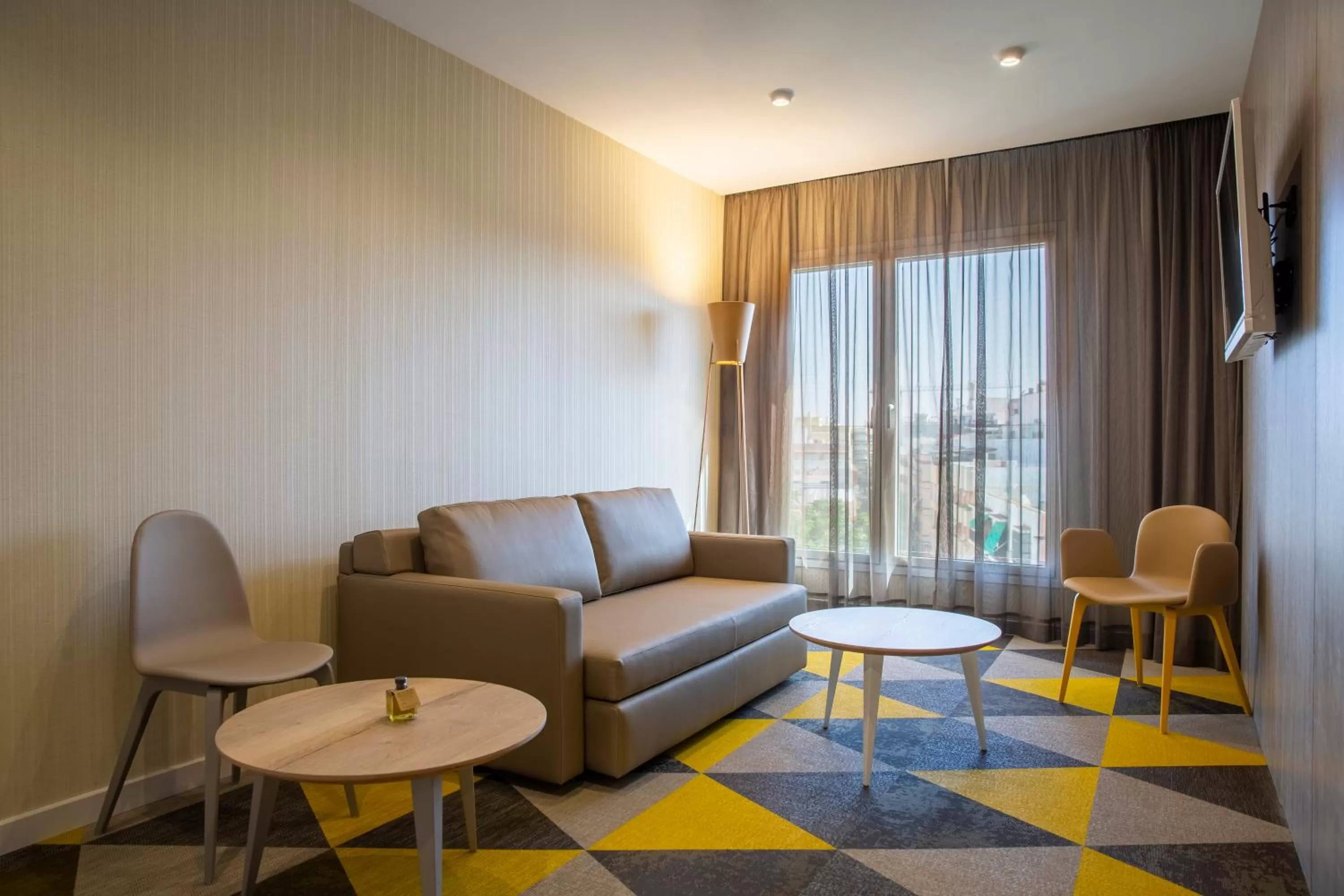 Seating area in Hotel Macià Sevilla Kubb