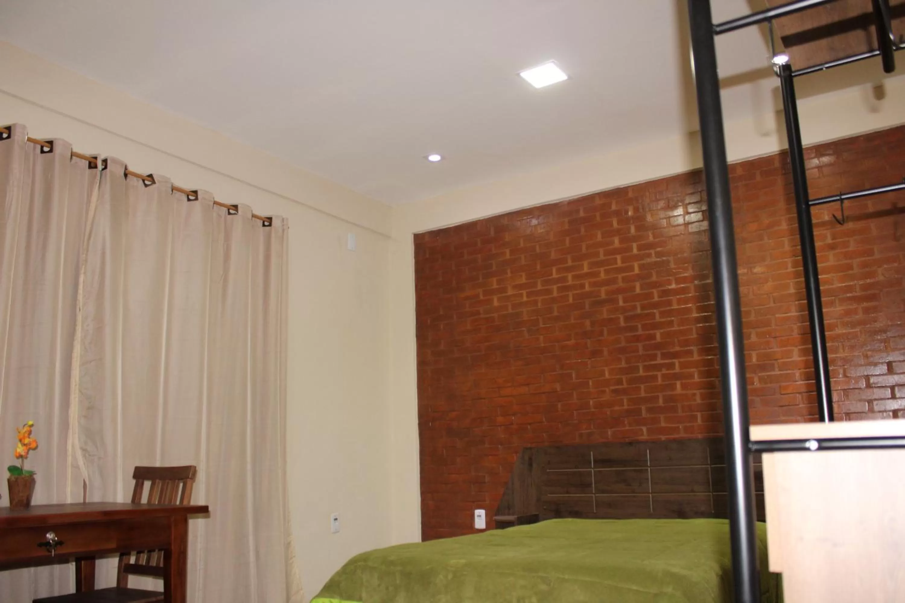 Bed in Pousada Morro dos Ventos