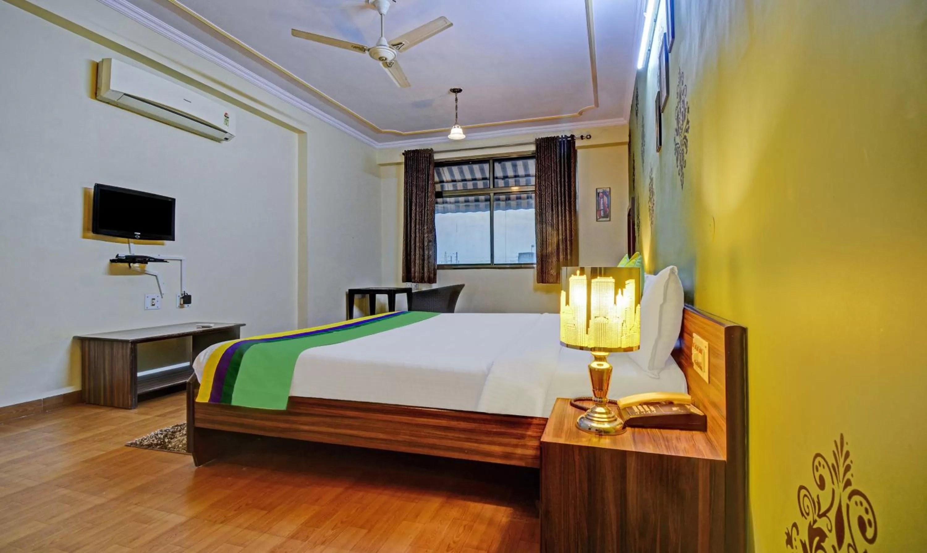 Bedroom, Bed in Treebo New Rockwell Vivek Vihar