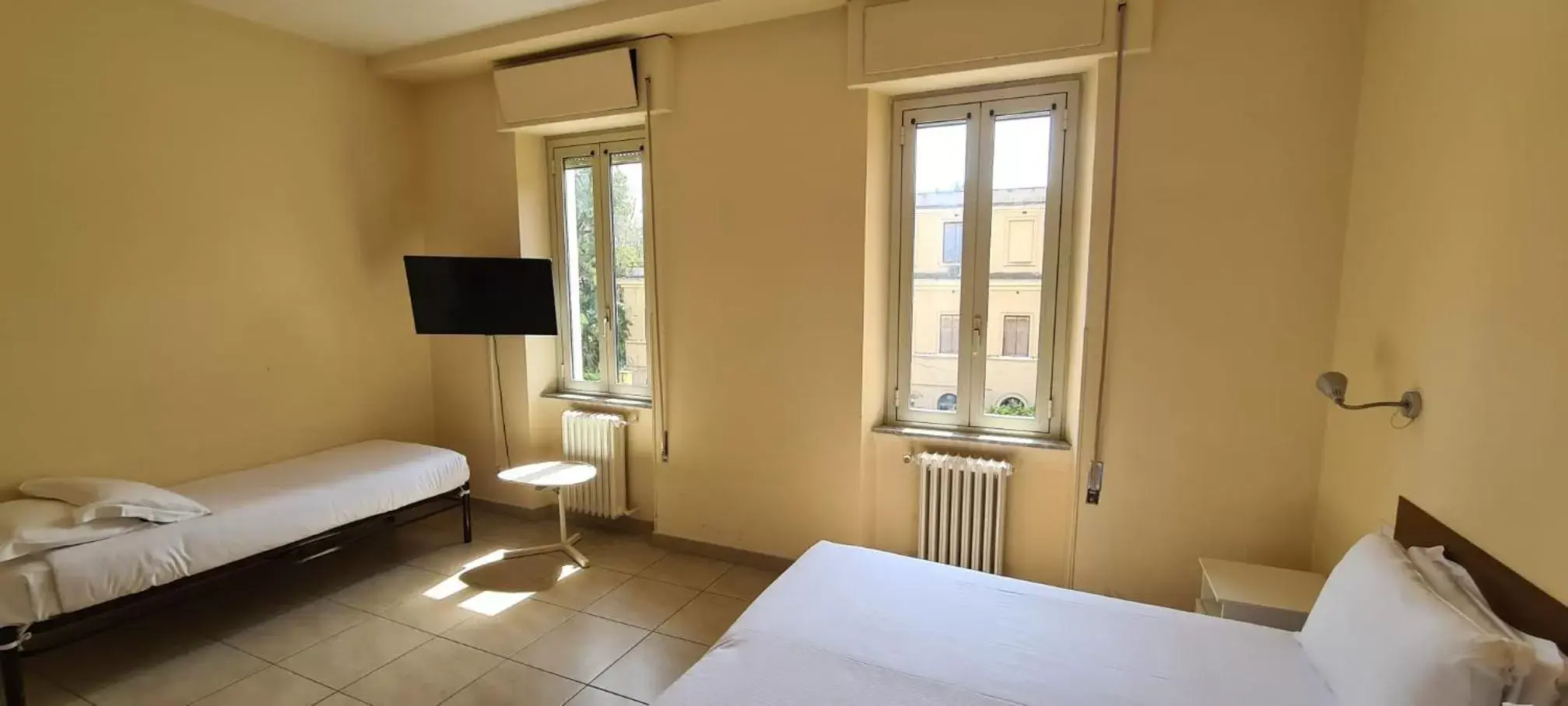 Triple Room with Private External Bathroom in Villa Riari Garden Triple Room with Private External Bathroom in Villa Riari Garden