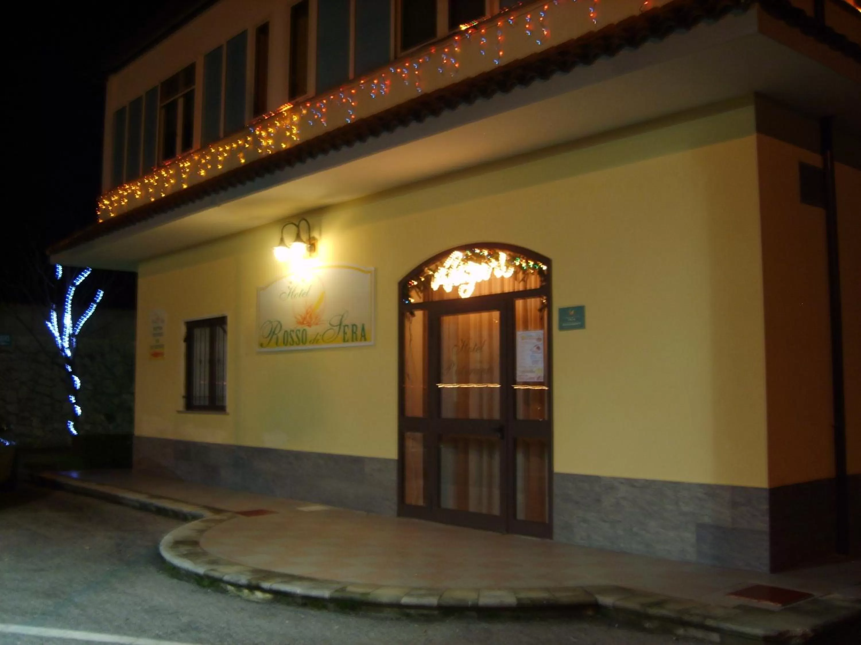 Property logo or sign in Hotel Rosso Di Sera