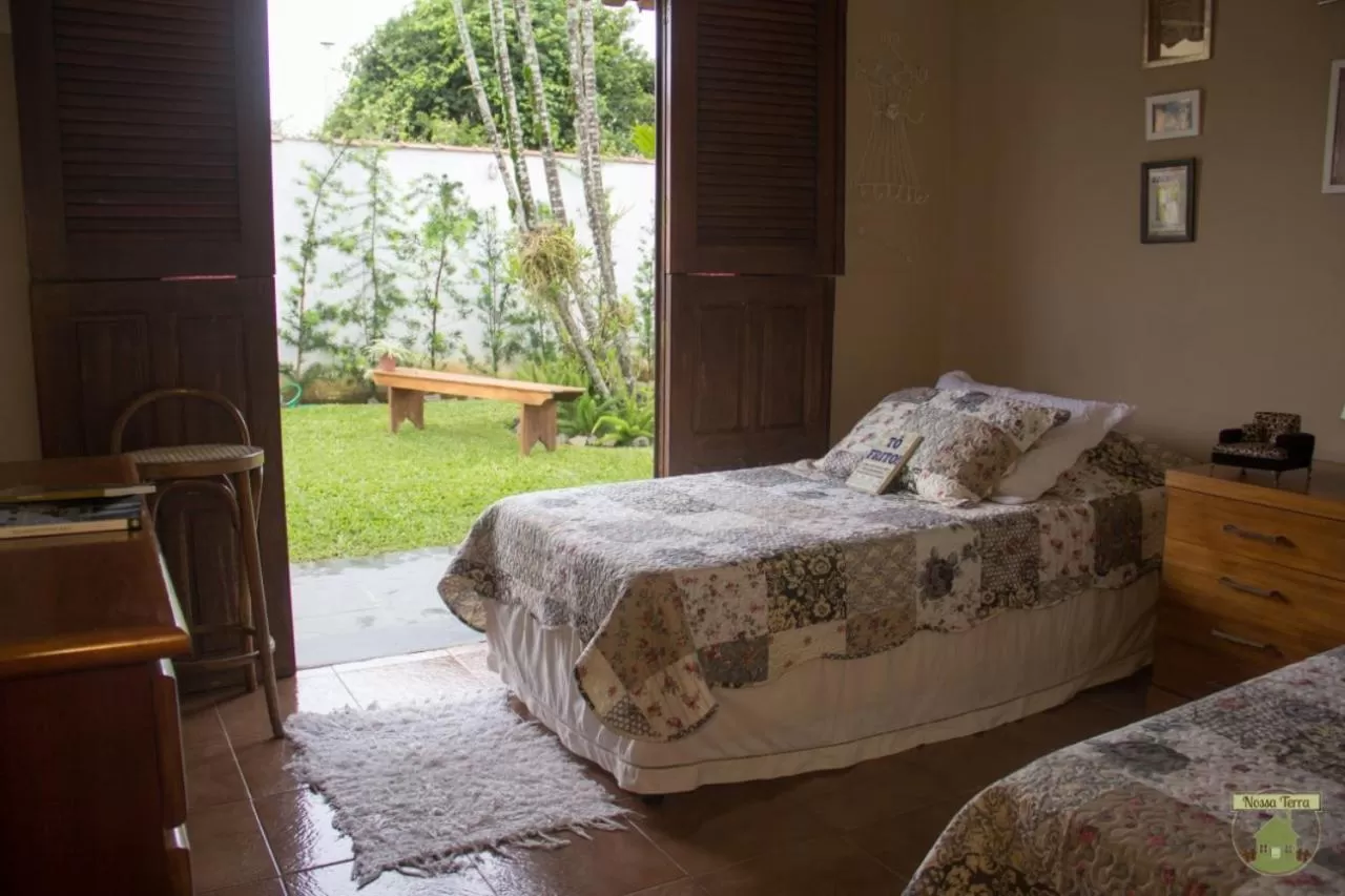 Bed in Pousada Nossa Terra