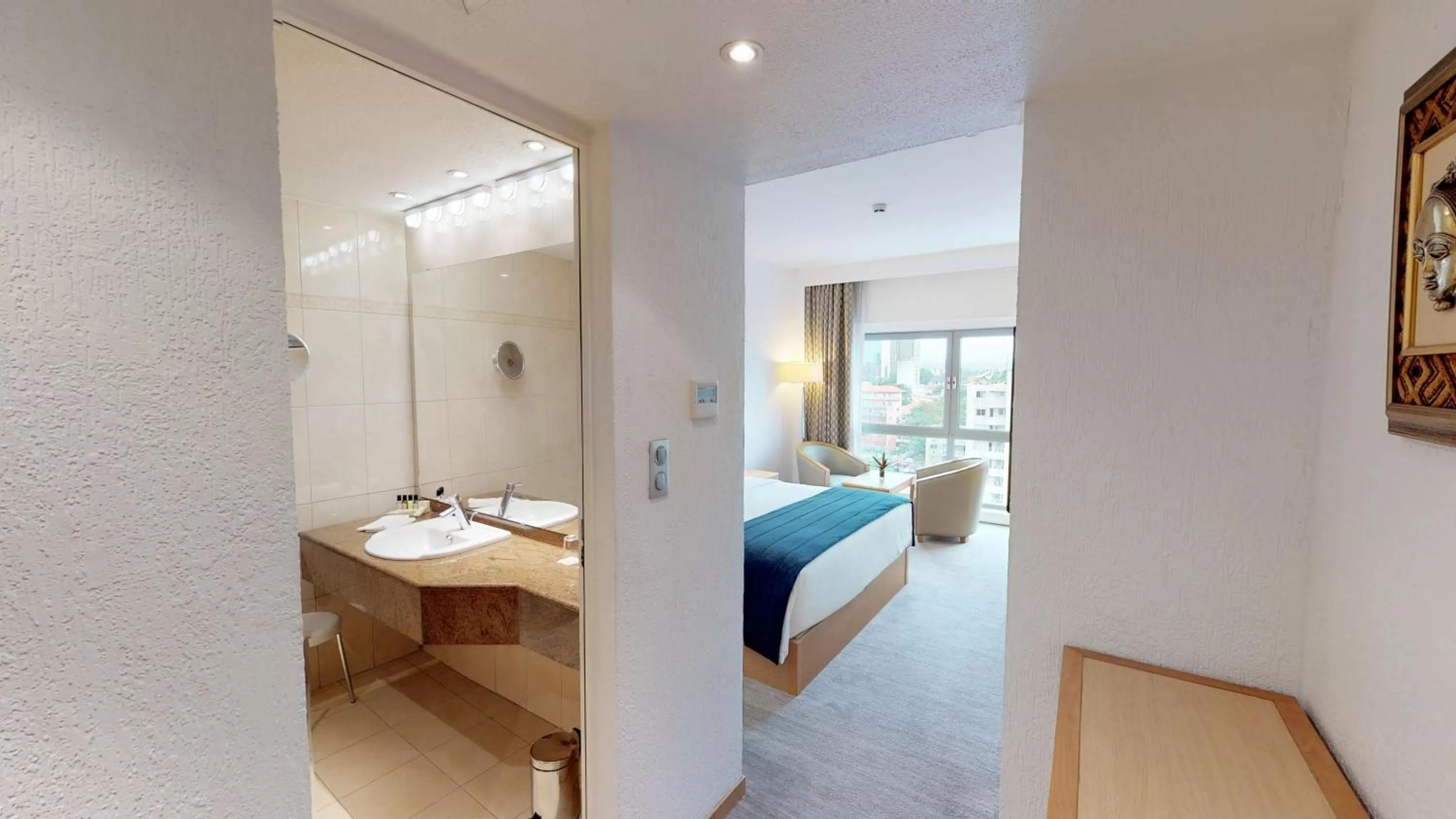 Photo of the whole room, Bed in Hotel Tiama Abidjan