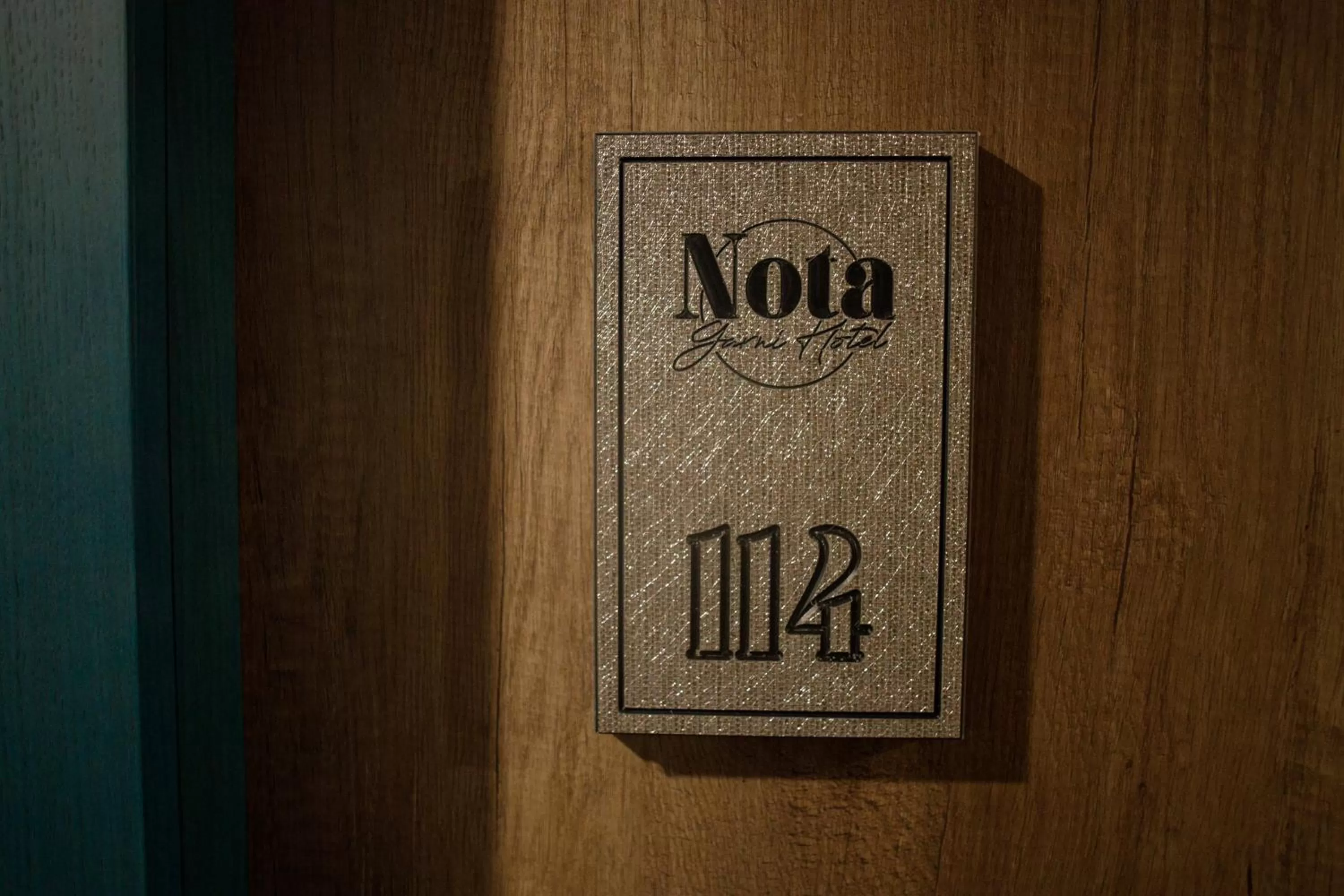 Property logo or sign in Hotel Nota