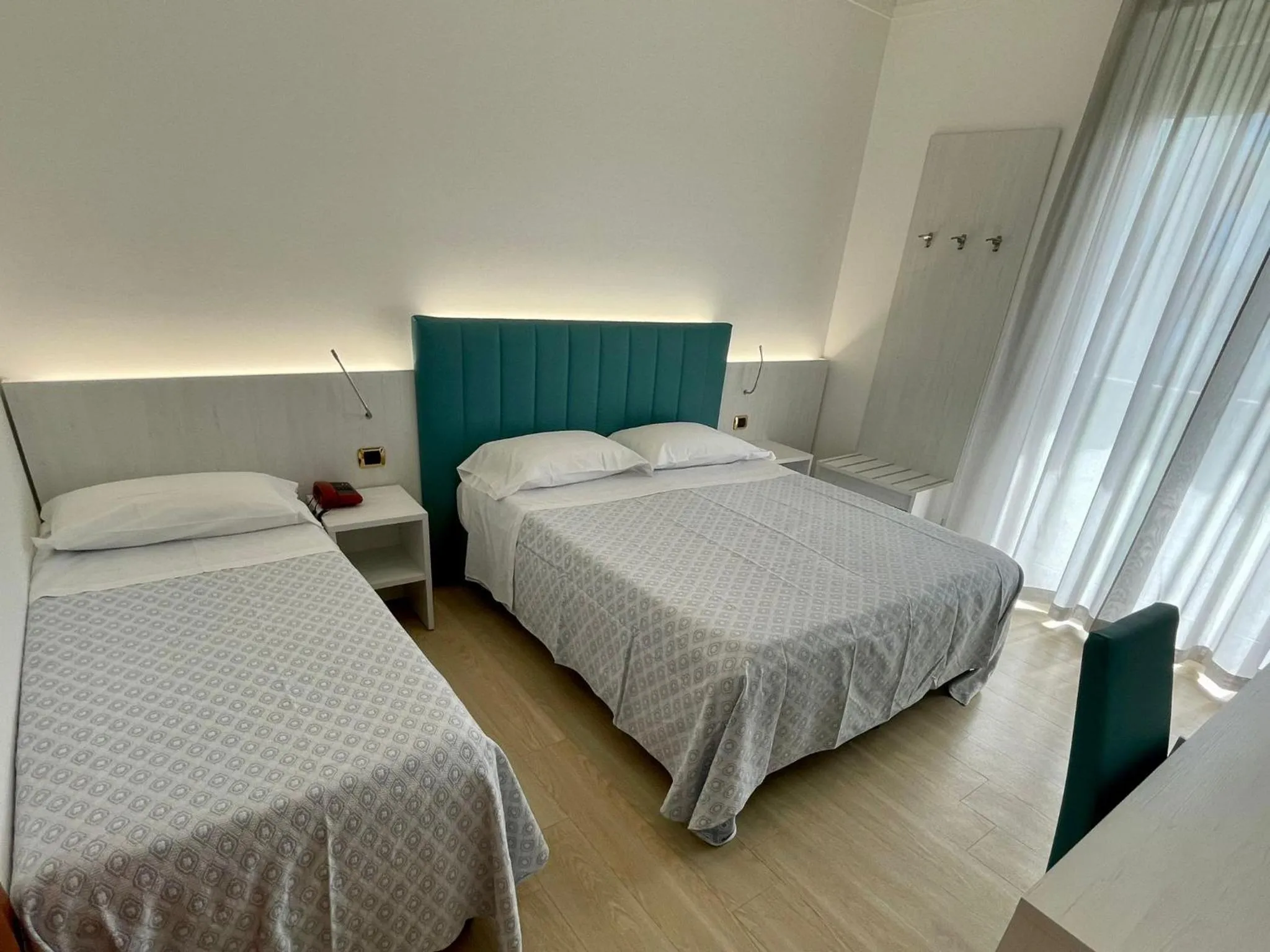 Bed in Hotel Corallo