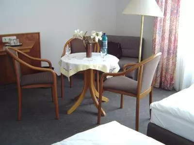 Seating area, Bed in Hotel Stiftswingert