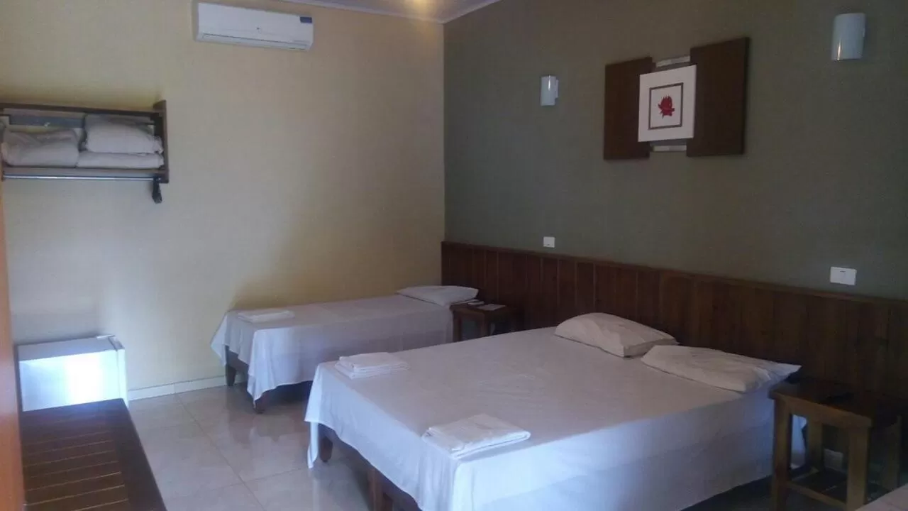 Bed in Pousada Manna