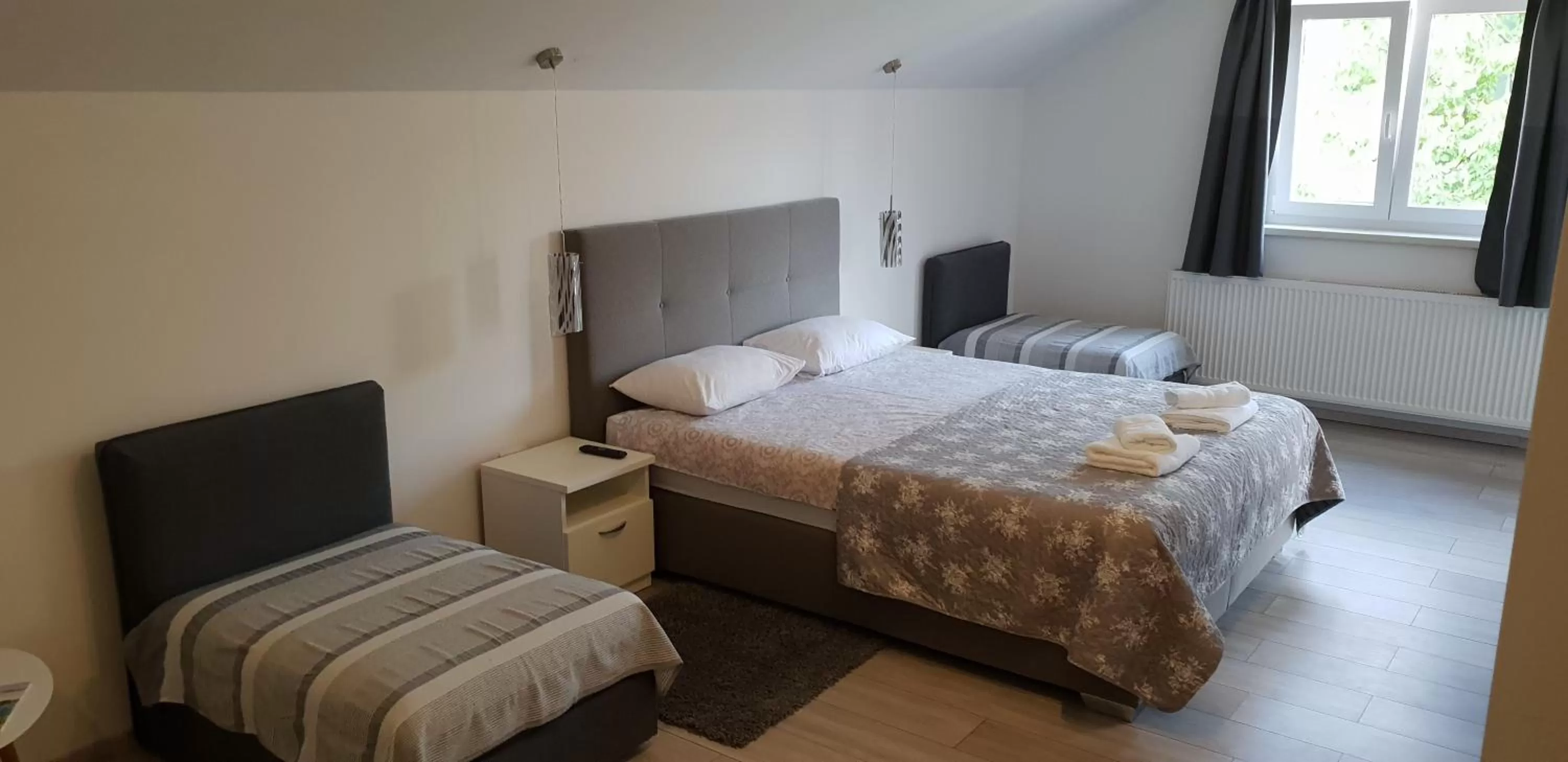 Bed in KE-TO Zagreb Airport Rooms