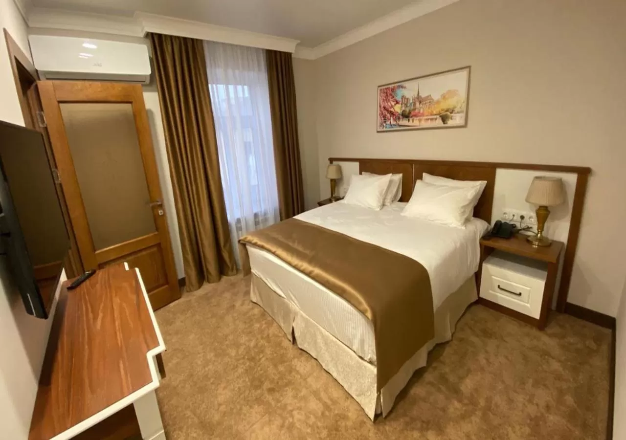 Bed in Boutique Hotel Kaspi