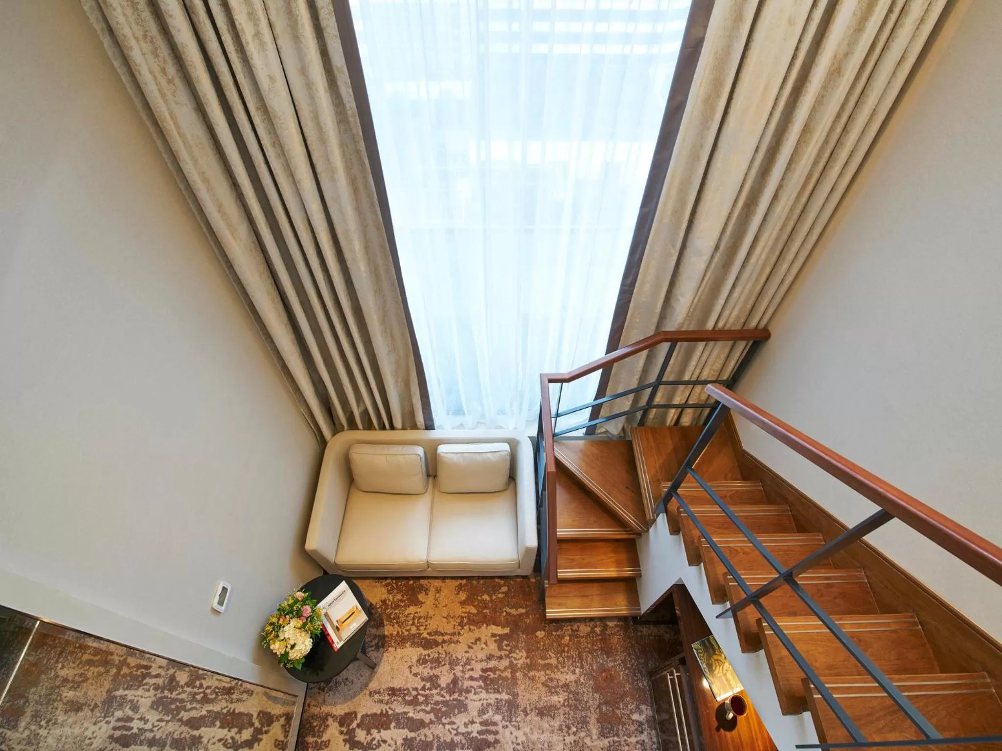 Seating area in Holiday Inn Singapore Little India by IHG