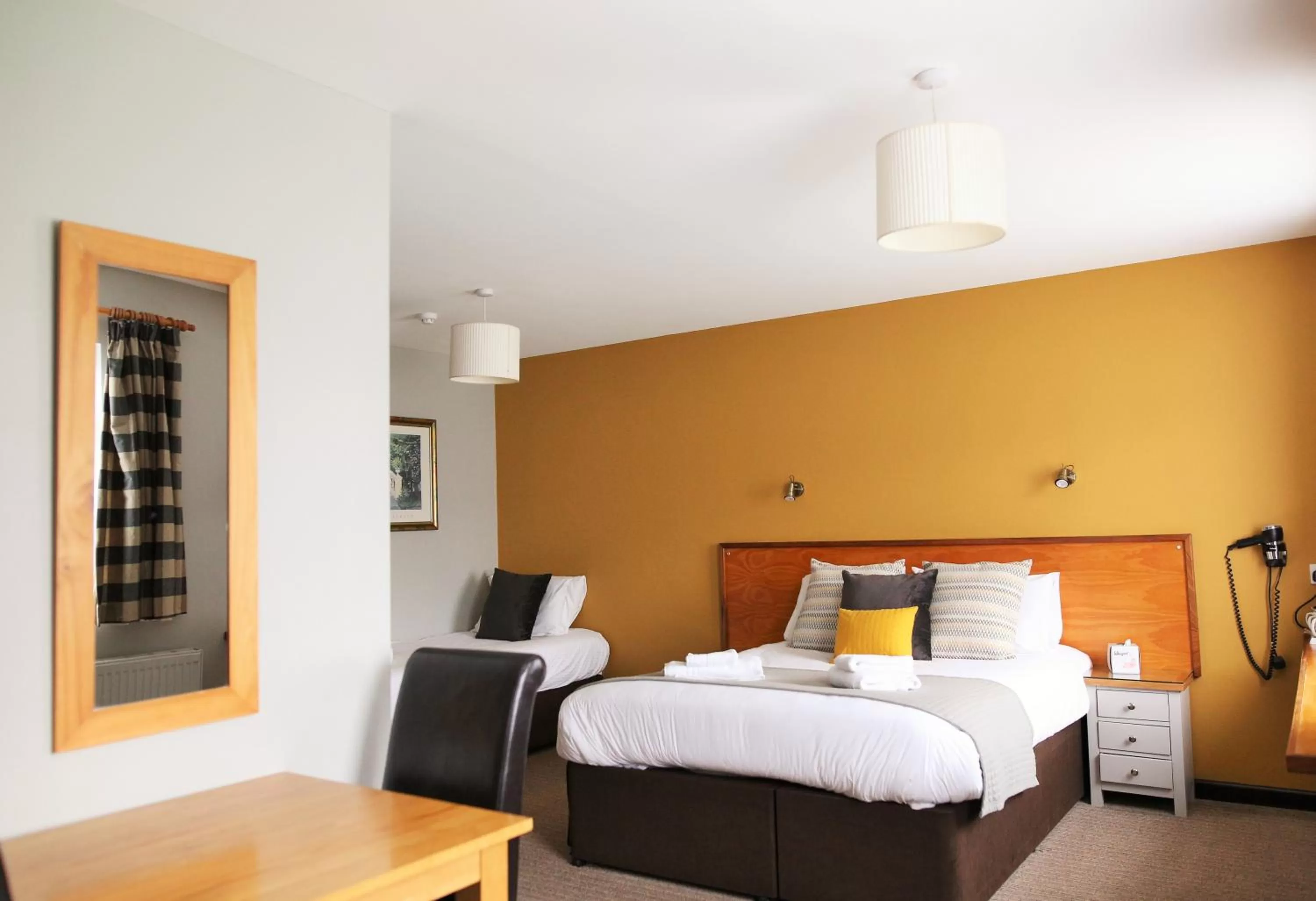 Bed in Tricky's Hotel