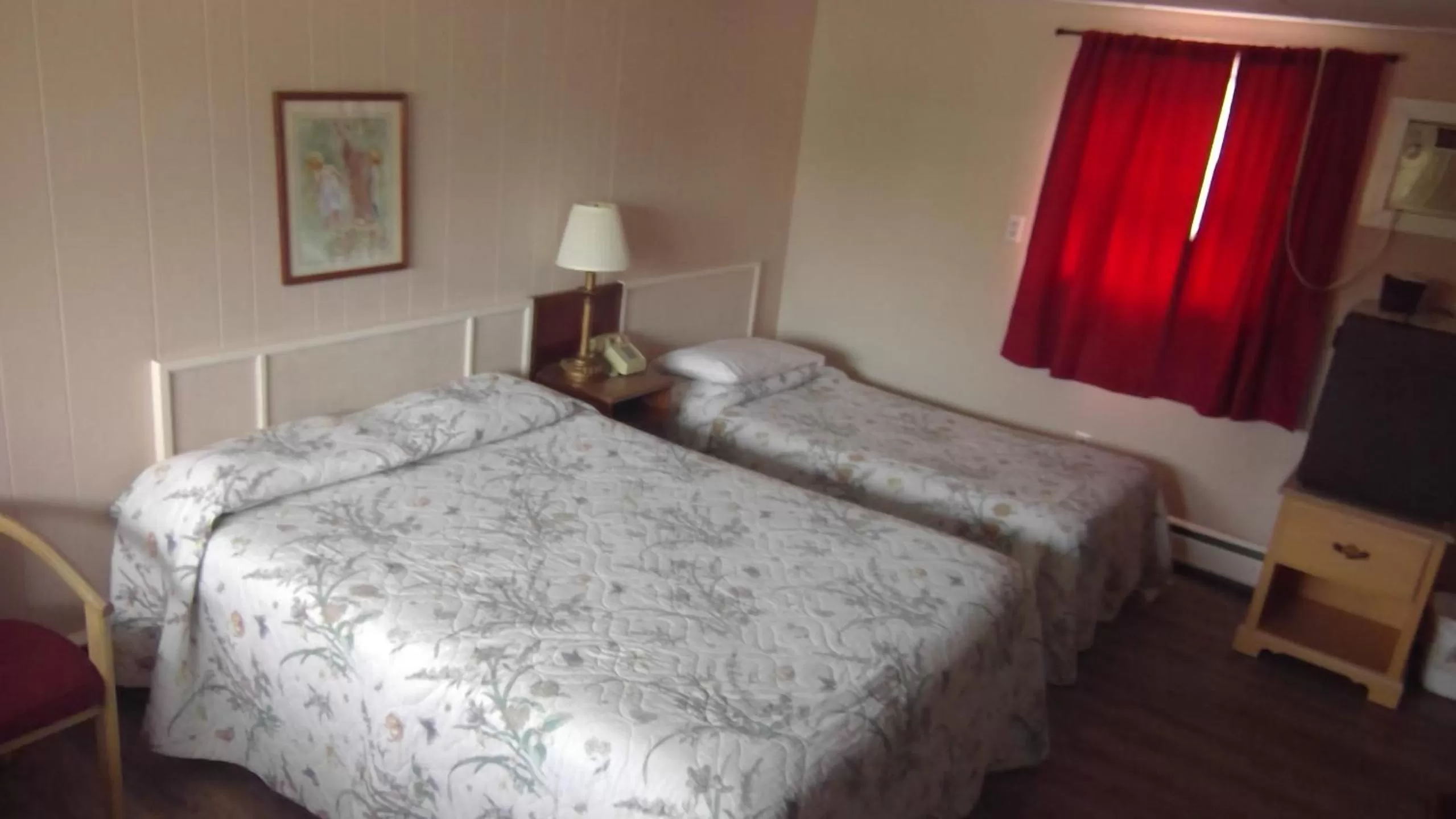 Bed in Northern Peaks Motor Inn