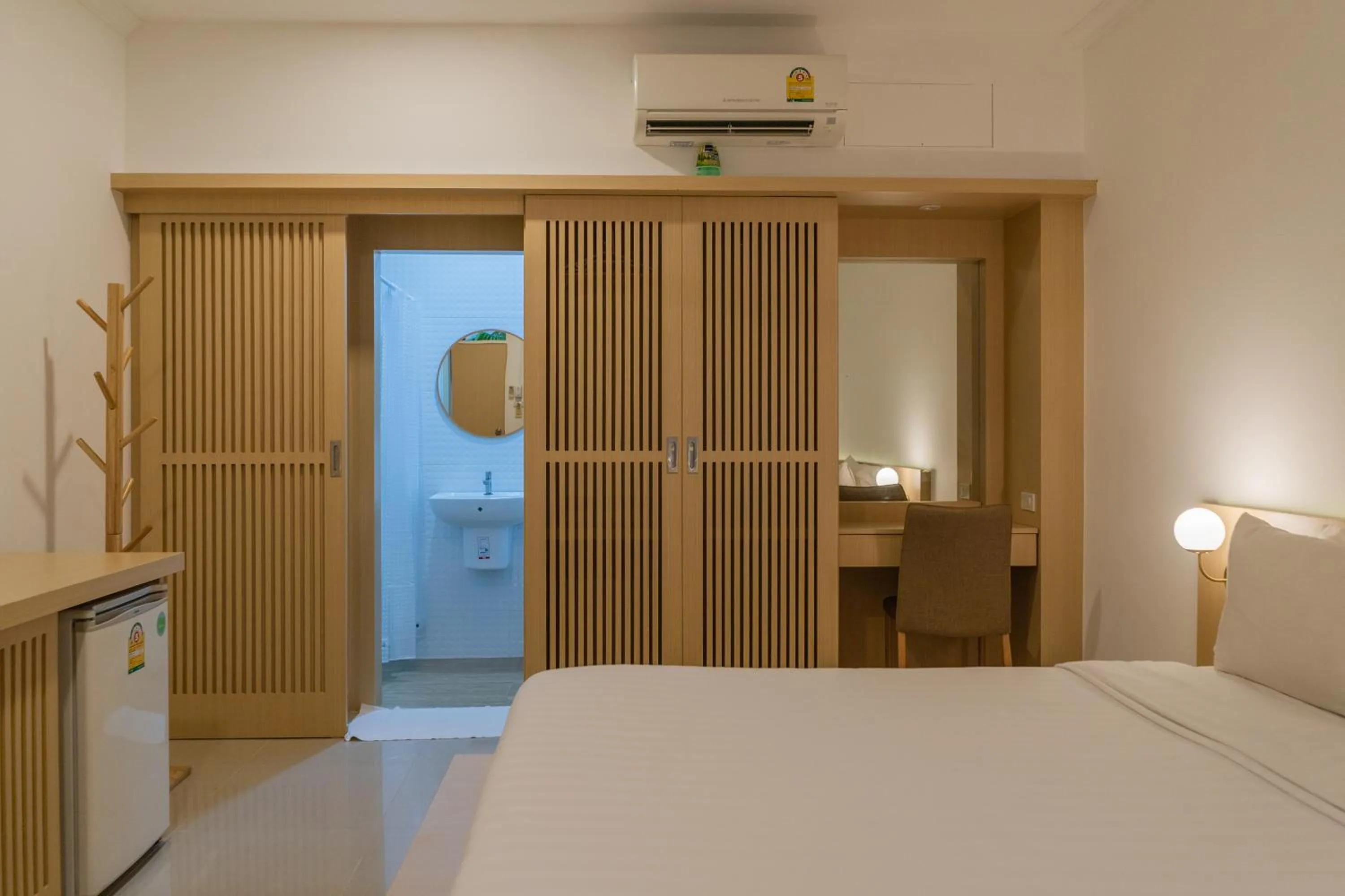 Photo of the whole room, Bed in Garden Home Kata