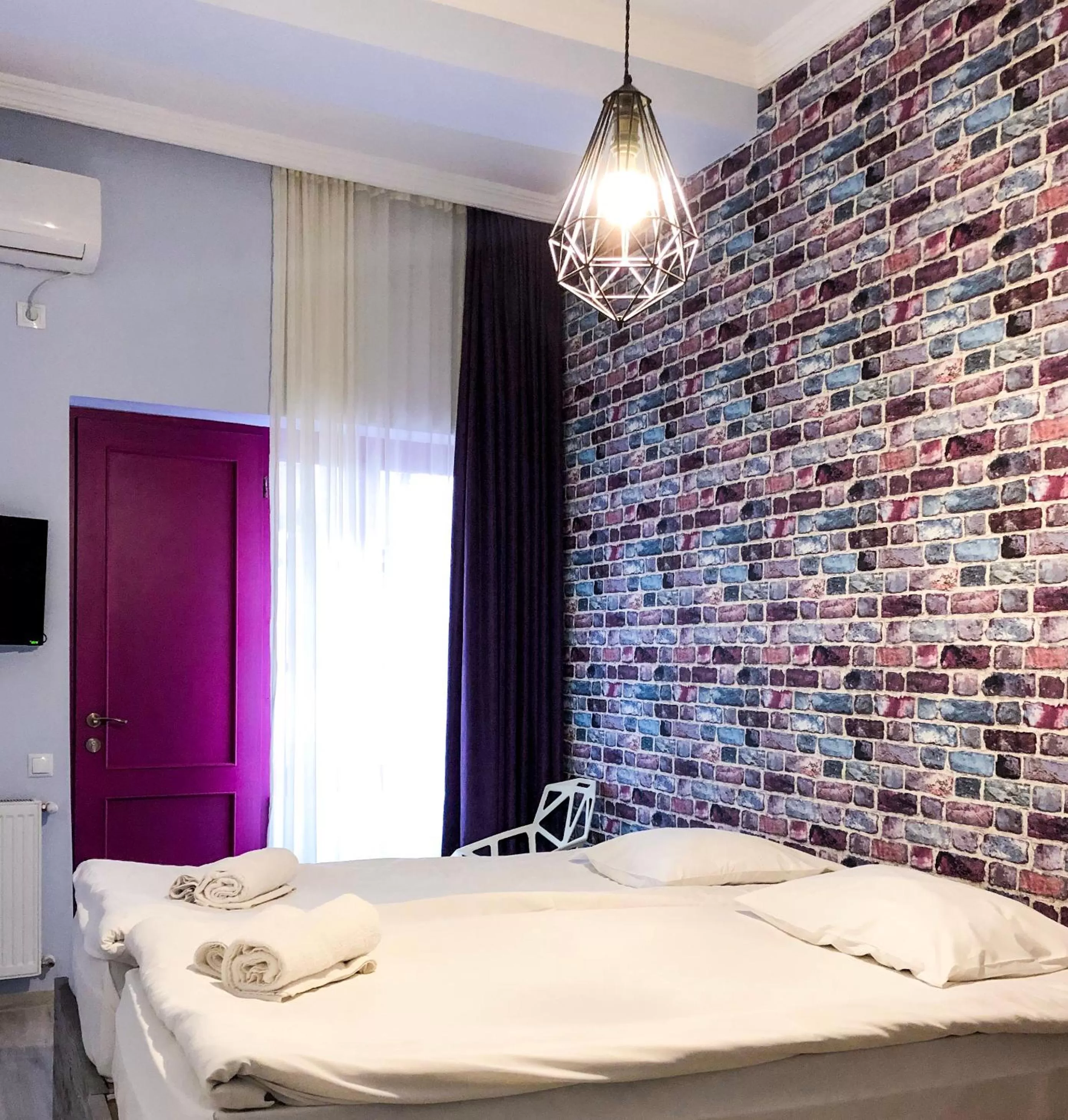 Bedroom in Check Point Hotel