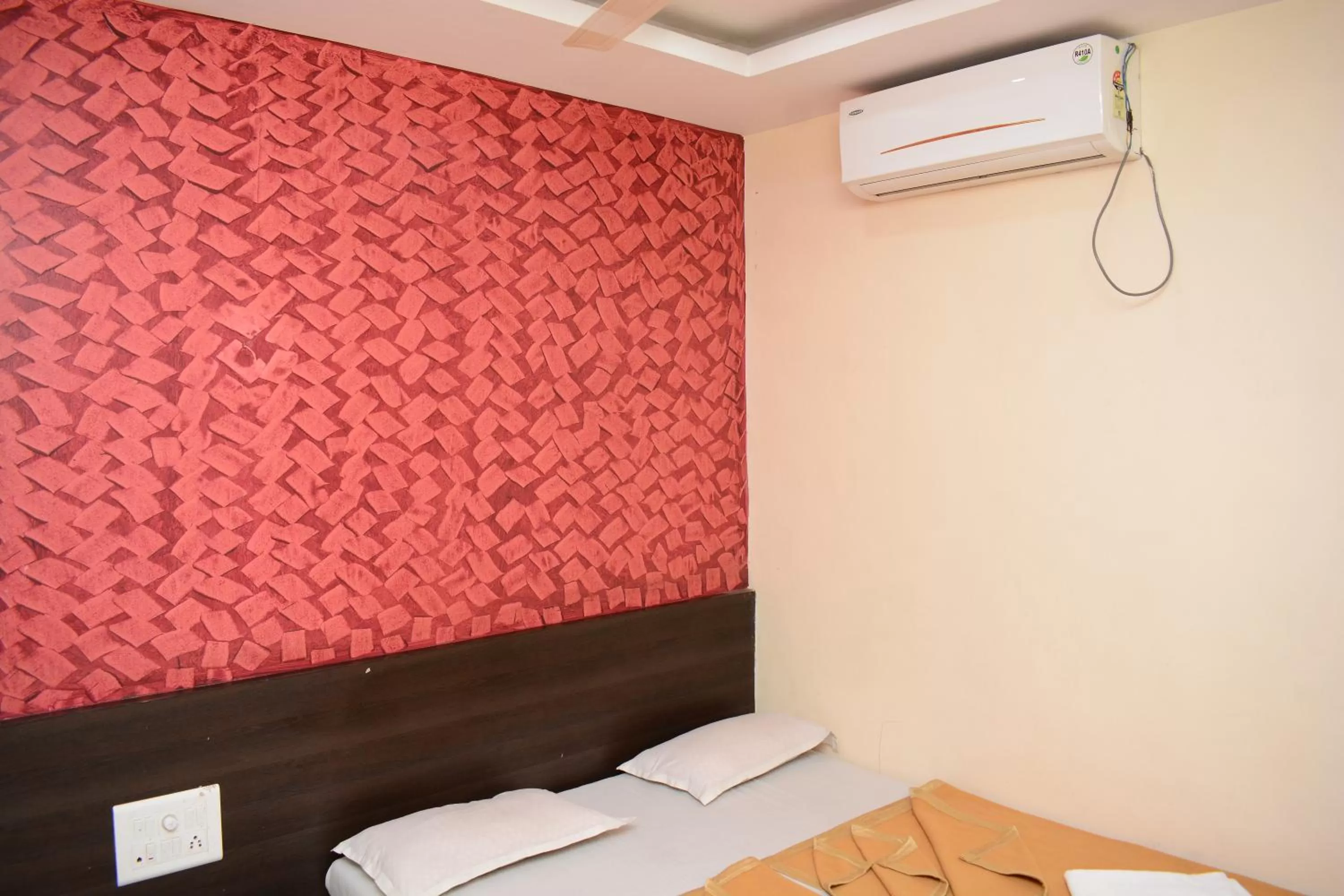 Bed in Hotel Sai Sampada NX