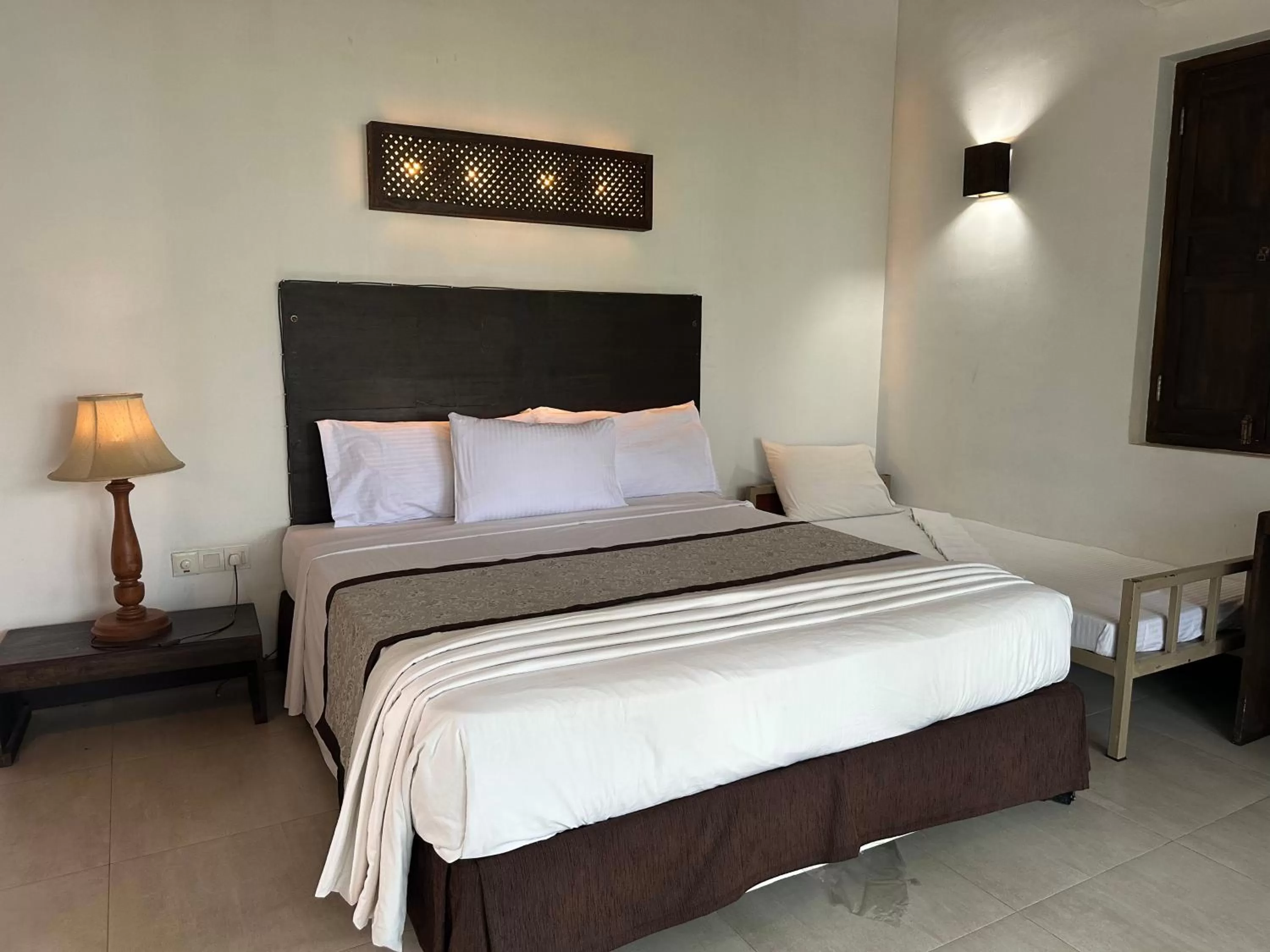 Bed in Amaluna Resorts