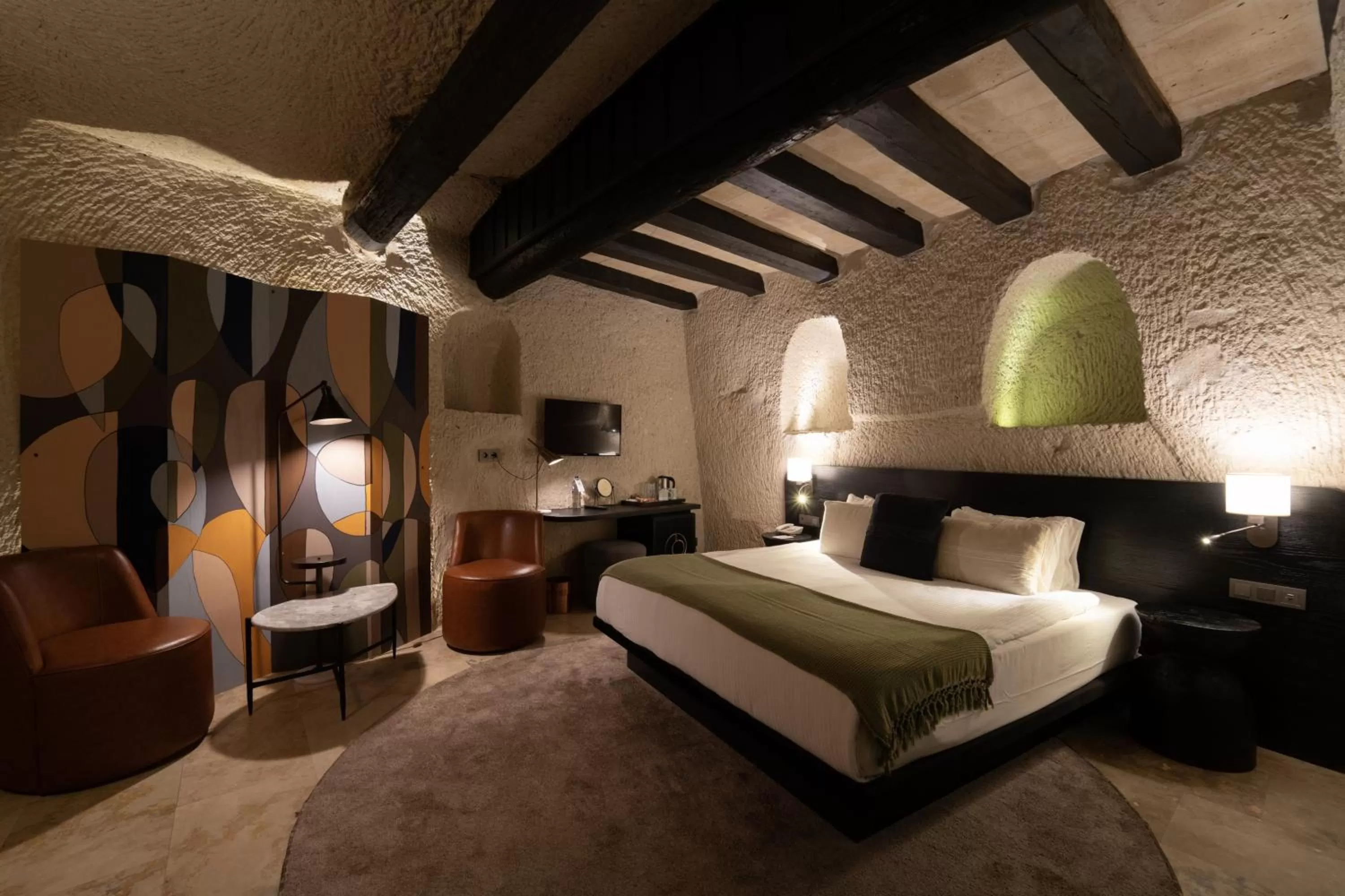 Bedroom, Bed in Artemis Cave Suites & Spa- Adults Only