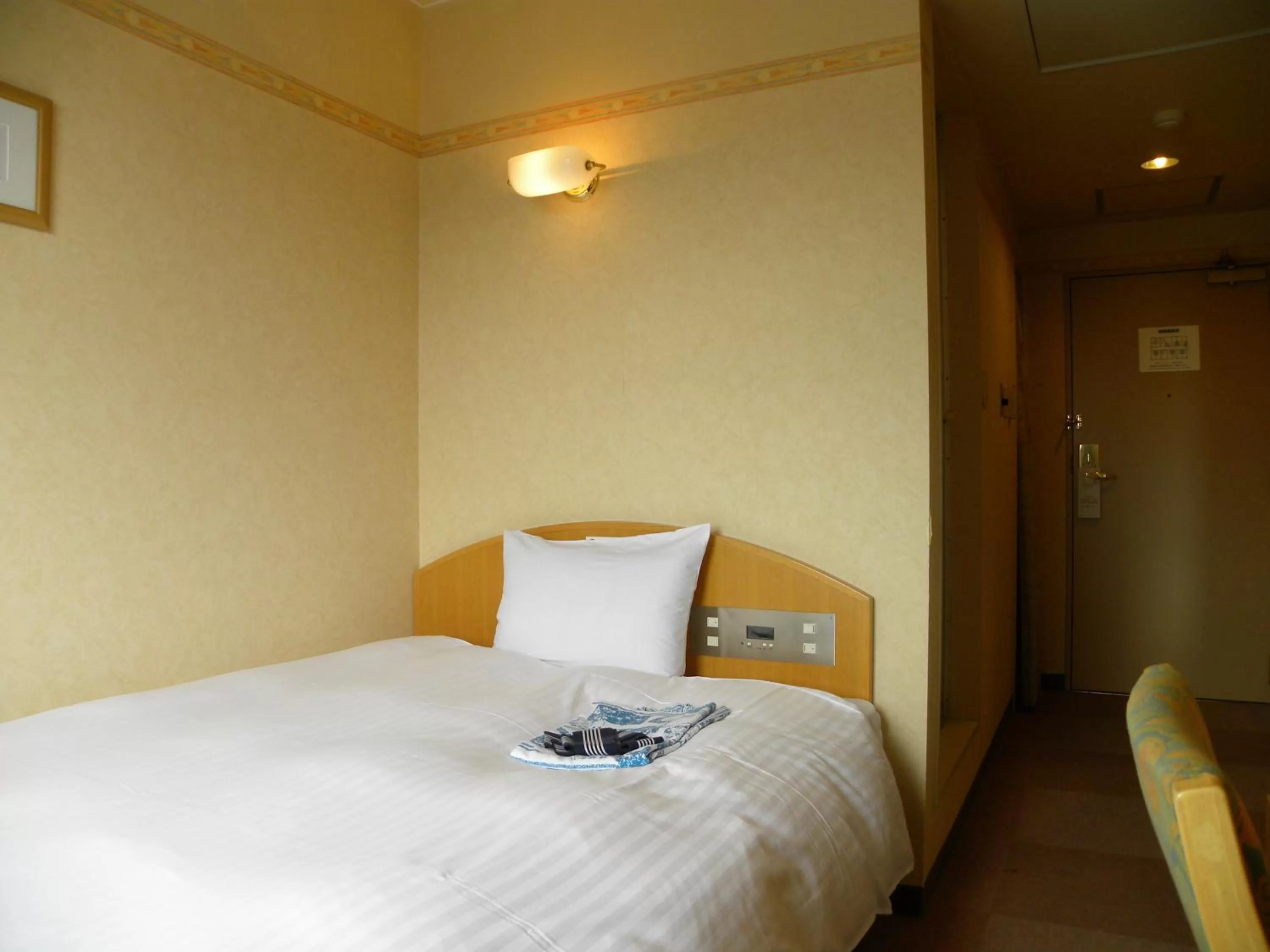 Photo of the whole room, Bed in Hotel Benex Yonezawa