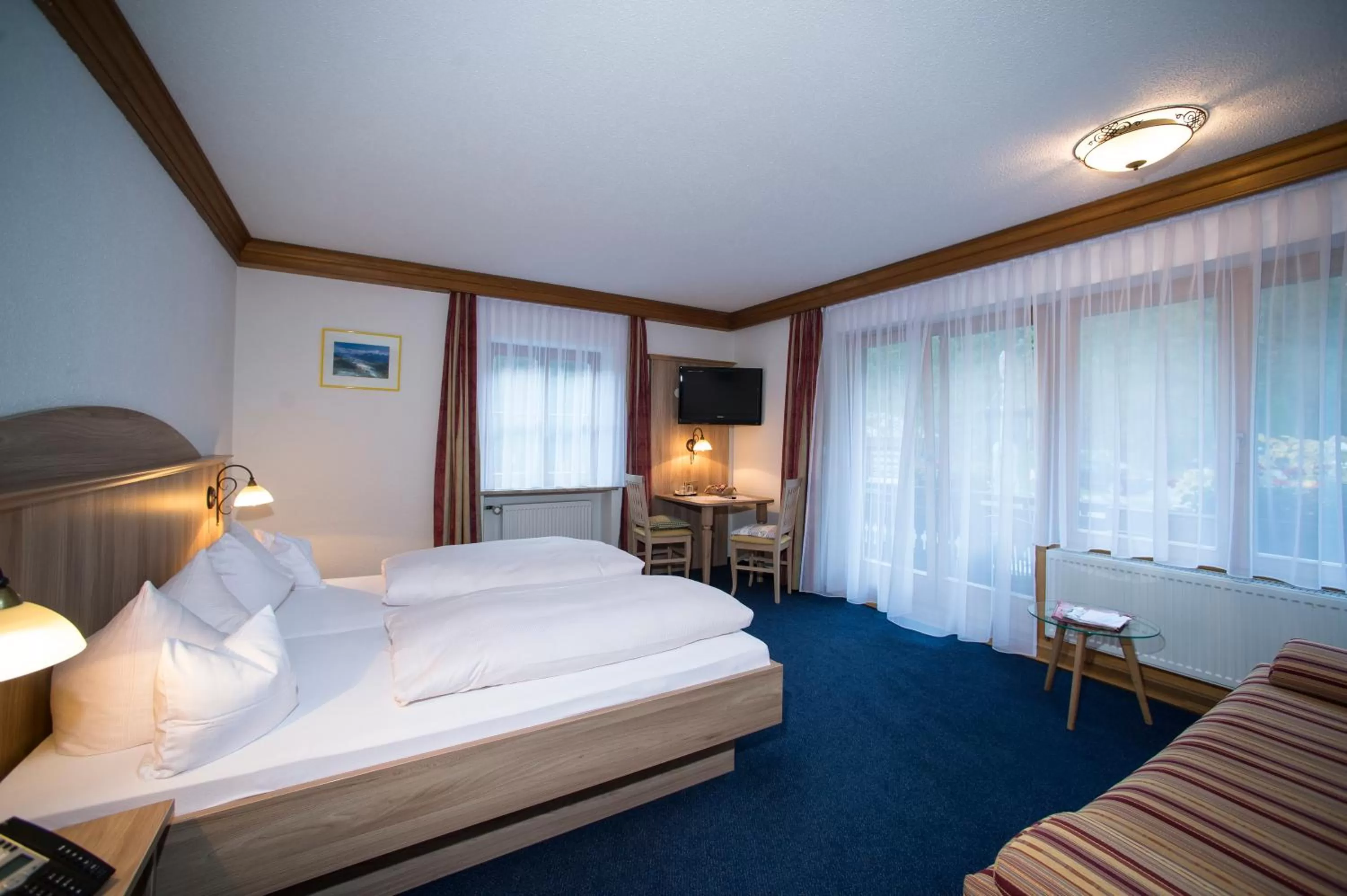 Bedroom, Bed in Aktivhotel & Gasthof Schmelz Ihr familienfreundliches Urlaubs Hotel mit Wellness Almsauna ab Februar Chiemgau Karte