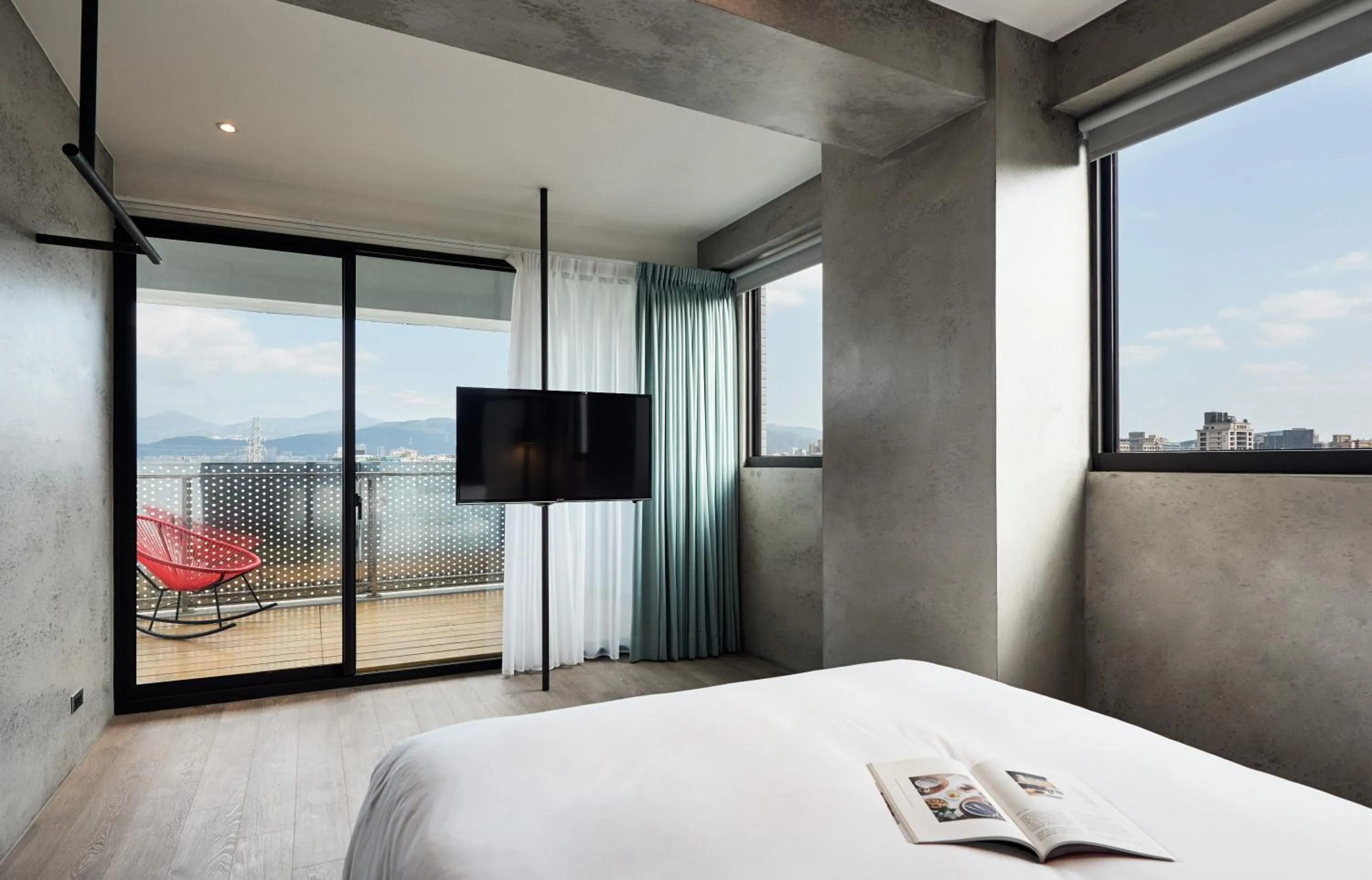 Balcony/Terrace, Bed in Waterfront Hotel