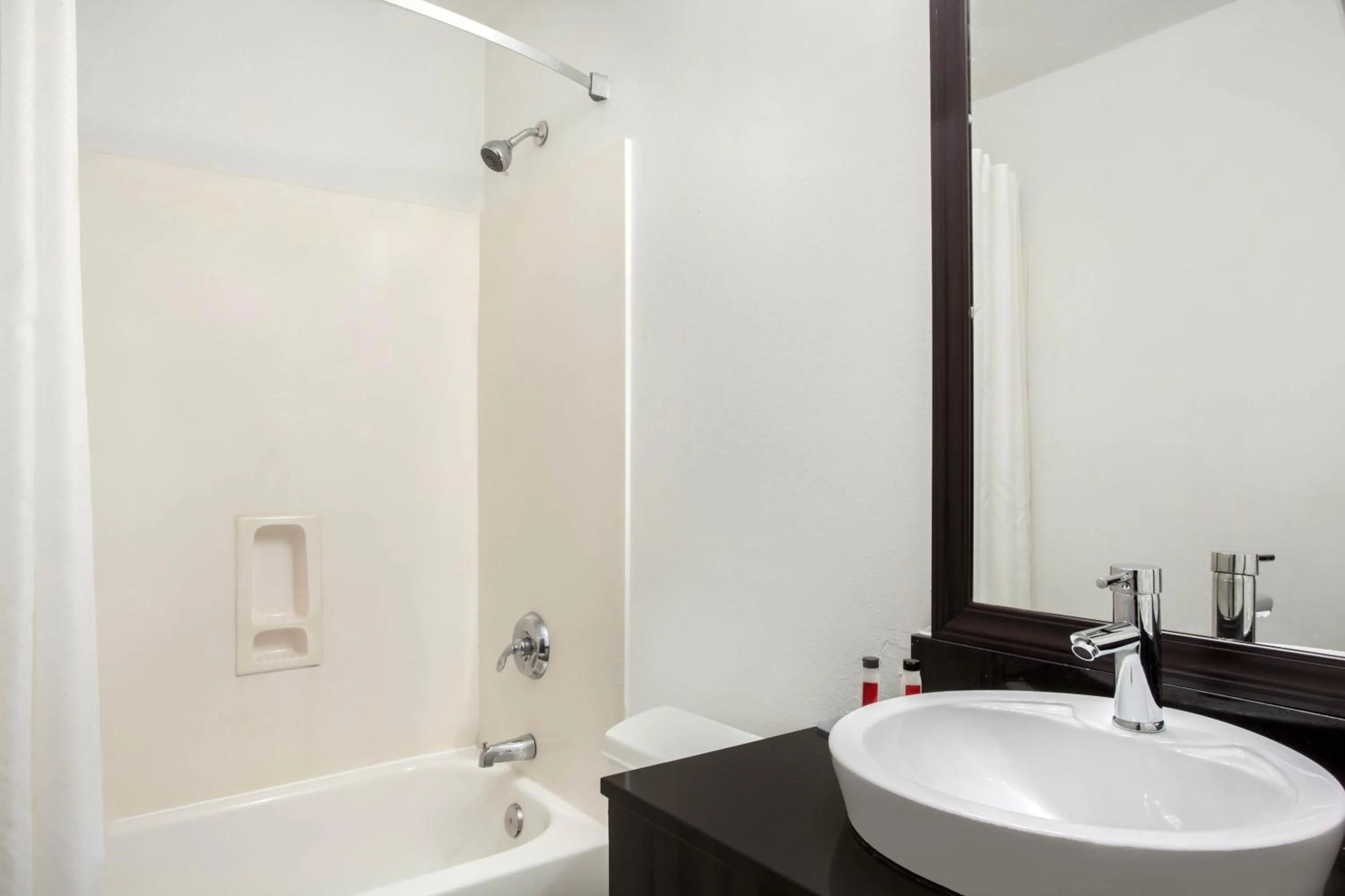 Bathroom in Super 8 by Wyndham Pensacola