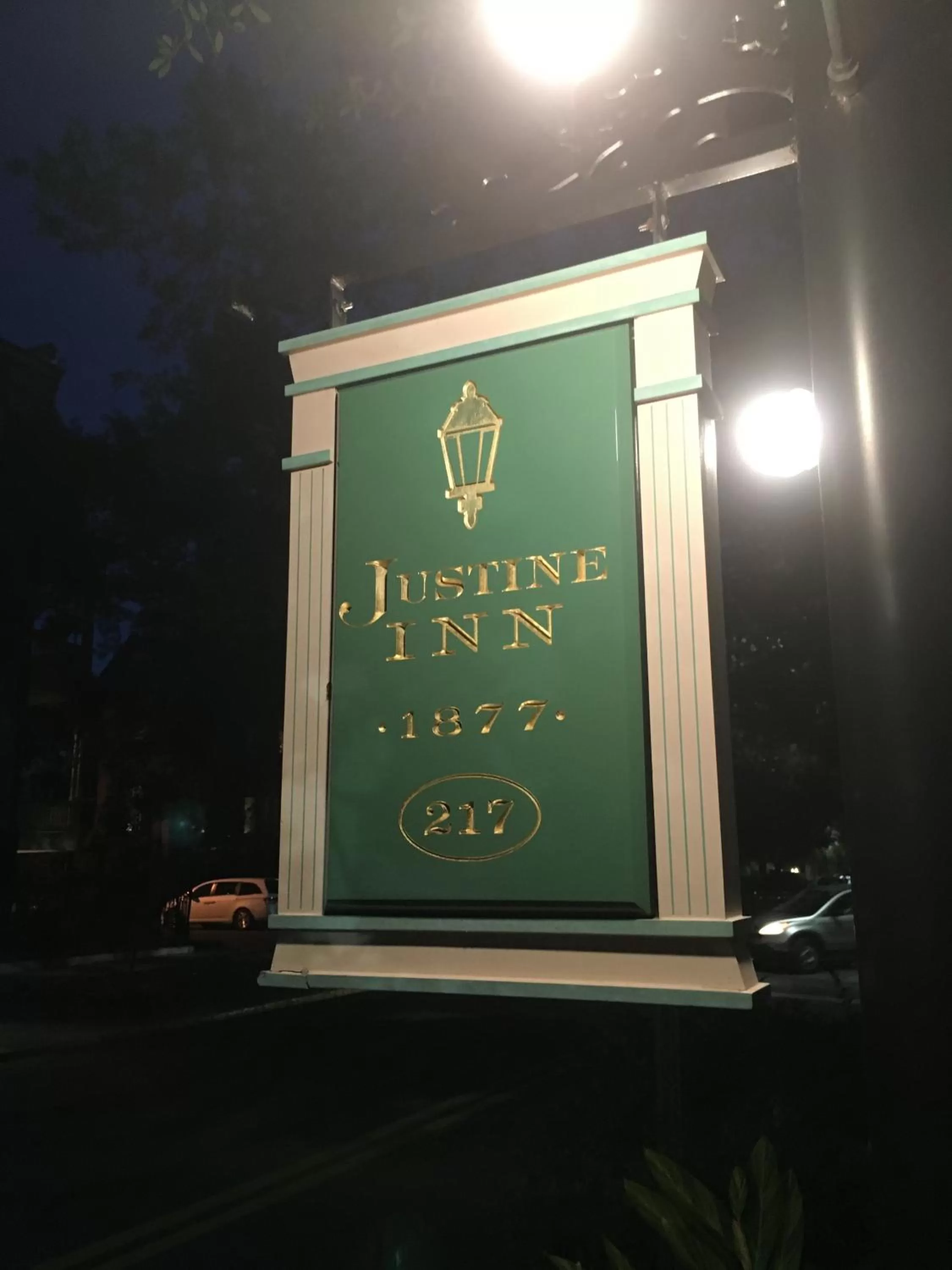 Property logo or sign in Justine Inn Savannah