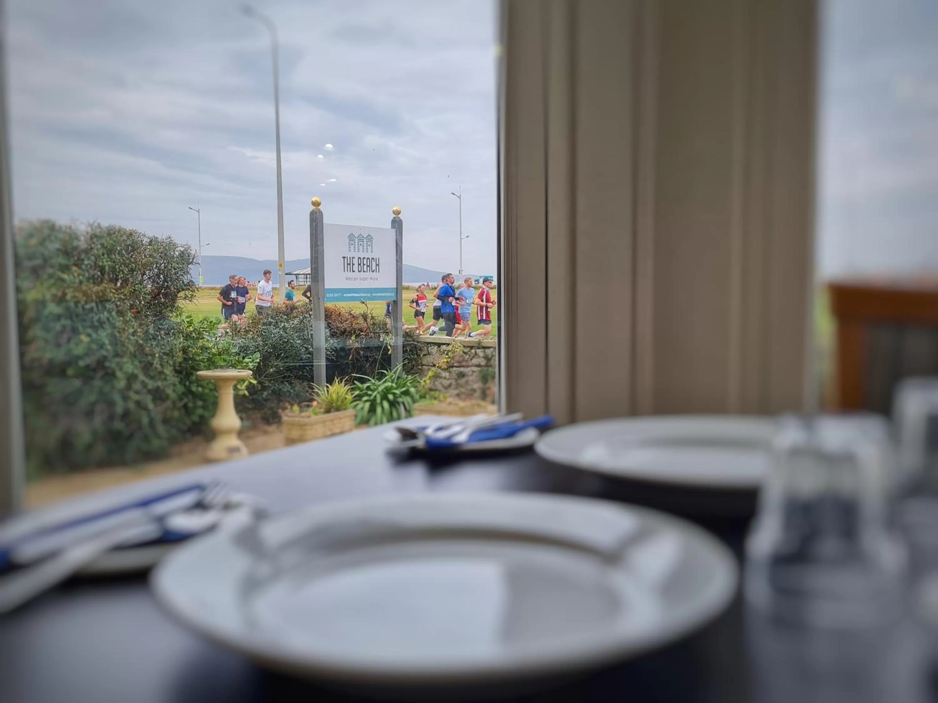 Property logo or sign in The Beach Weston