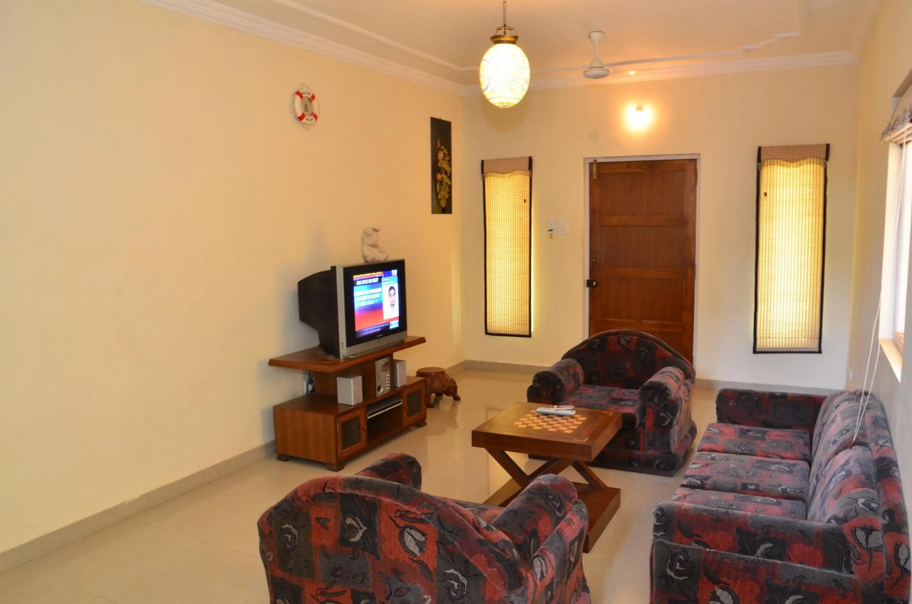 Communal lounge/ TV room in A's Holiday Beach Resort