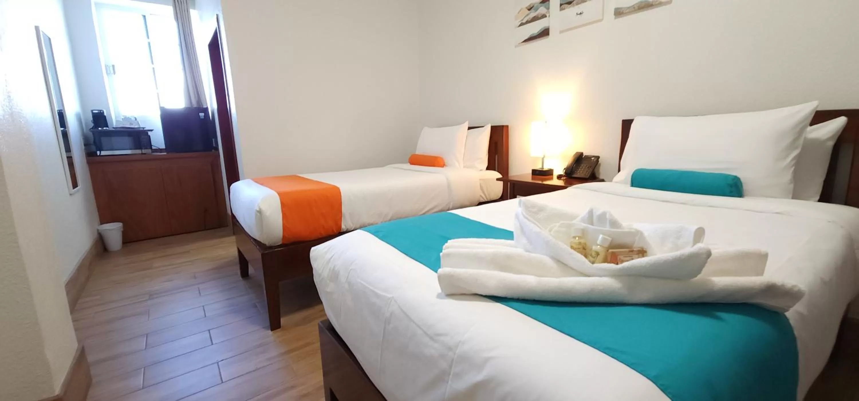 Bedroom, Bed in Voyager Sun & Reef Hotel