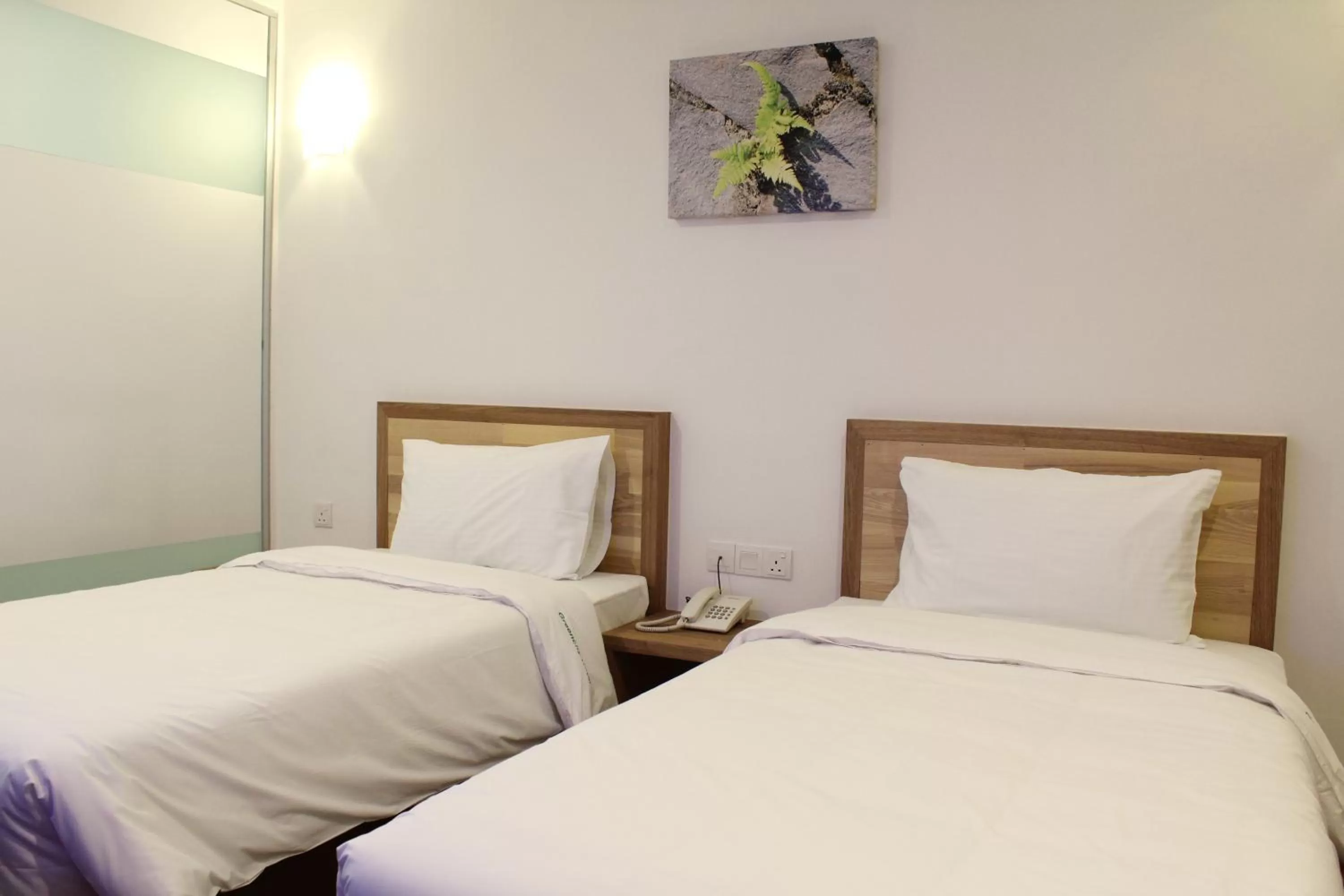 Bed in Greencity Hotel